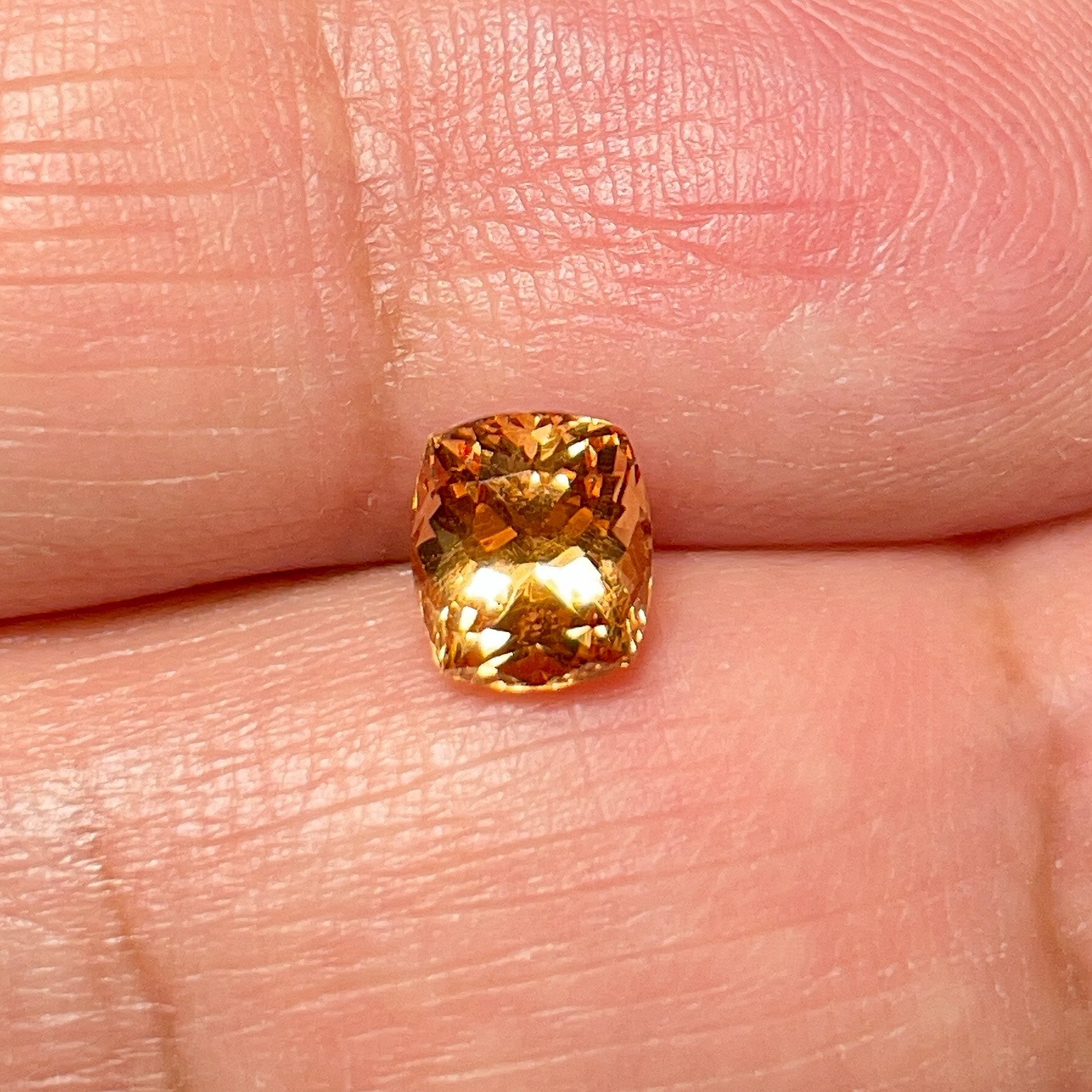 1.55Ct Orange Grossular Garnet Merelani Tanzania.