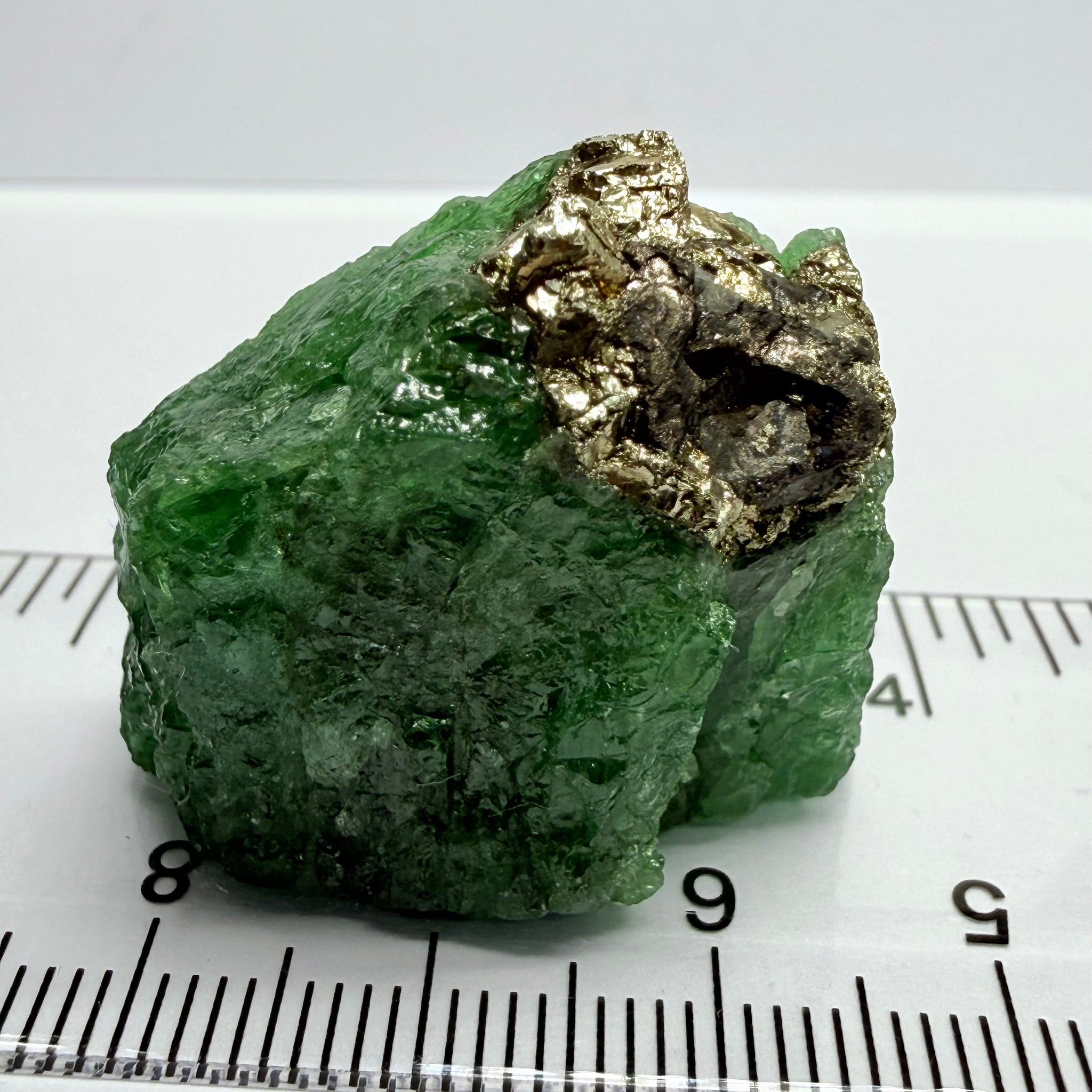 Tsavorite Crystal, Specimen Grade, 126.63ct, Merelani, Tanzania, Untreated Unheated, the flat standup portion is not sliced, it has natural etching on it and sits perfectly flat