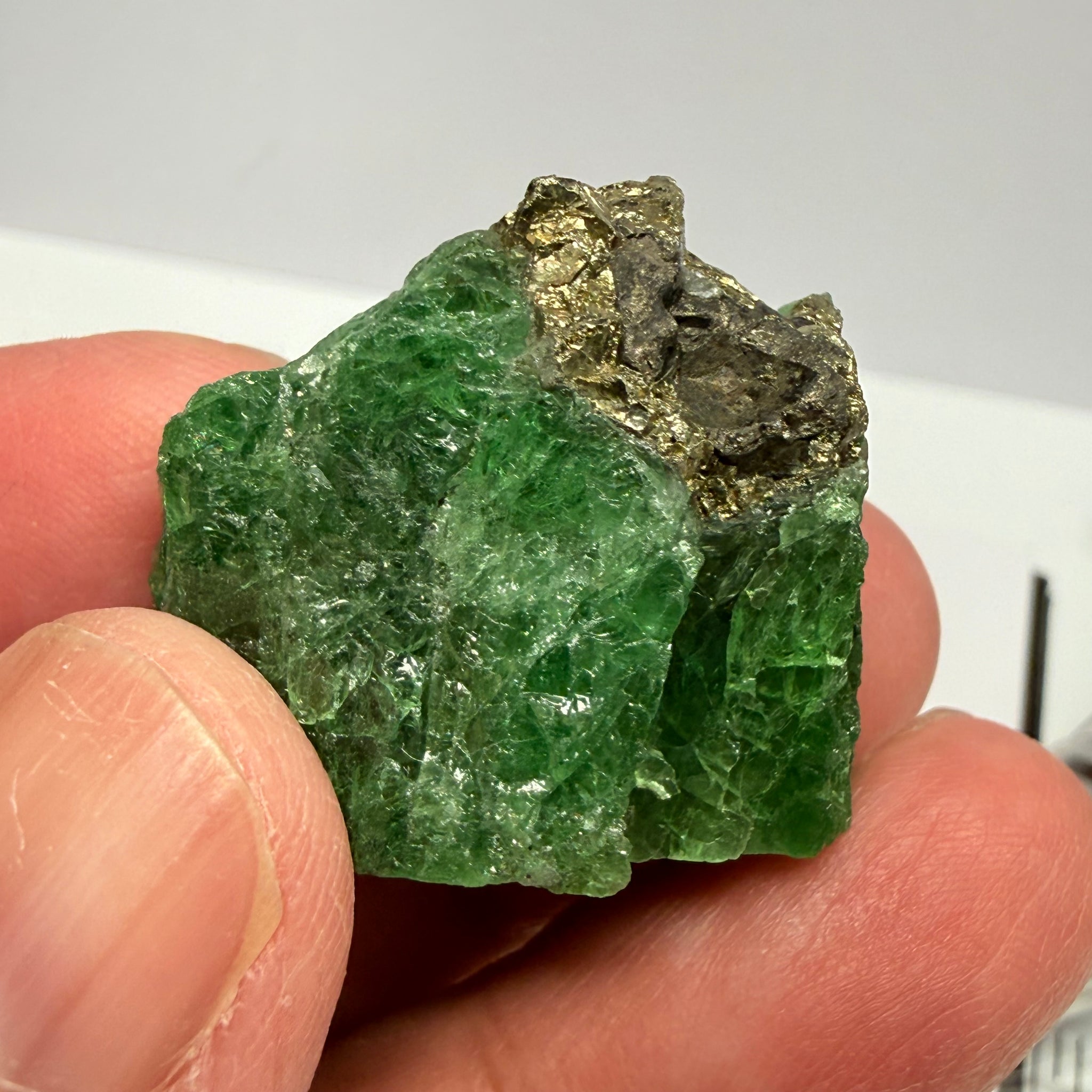 Tsavorite Crystal, Specimen Grade, 126.63ct, Merelani, Tanzania, Untreated Unheated, the flat standup portion is not sliced, it has natural etching on it and sits perfectly flat