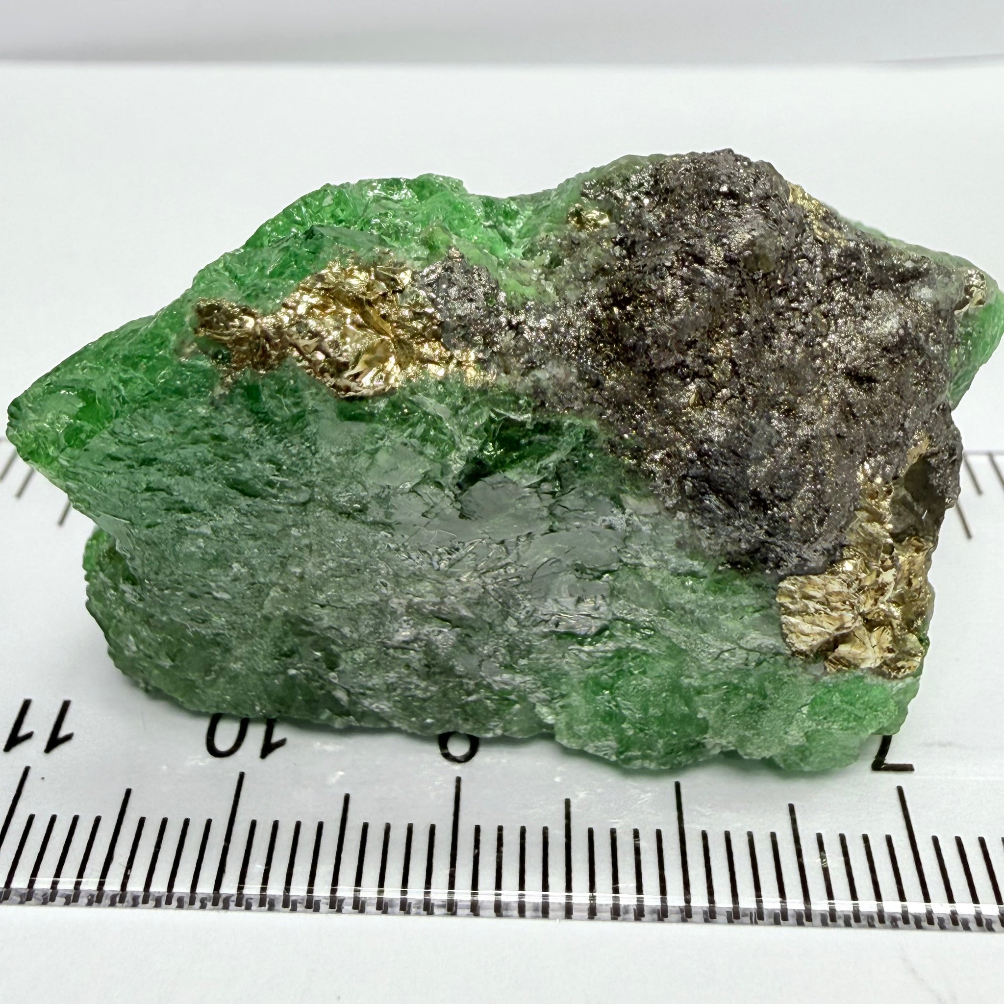 Tsavorite Crystal, Specimen Grade, 233.89ct, Merelani, Tanzania, Untreated Unheated, the flat standup portion is not sliced, it has natural etching on it and sits perfectly flat