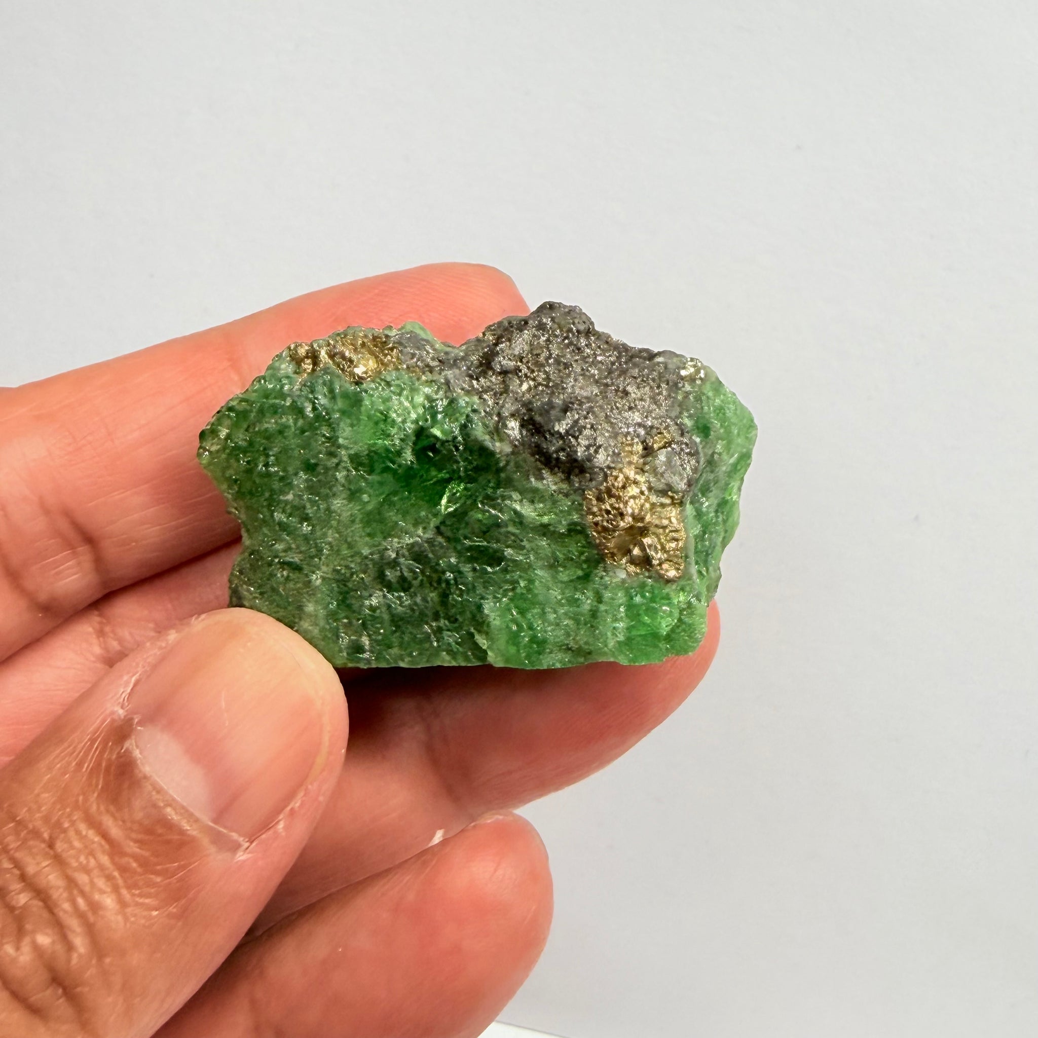 Tsavorite Crystal, Specimen Grade, 233.89ct, Merelani, Tanzania, Untreated Unheated, the flat standup portion is not sliced, it has natural etching on it and sits perfectly flat