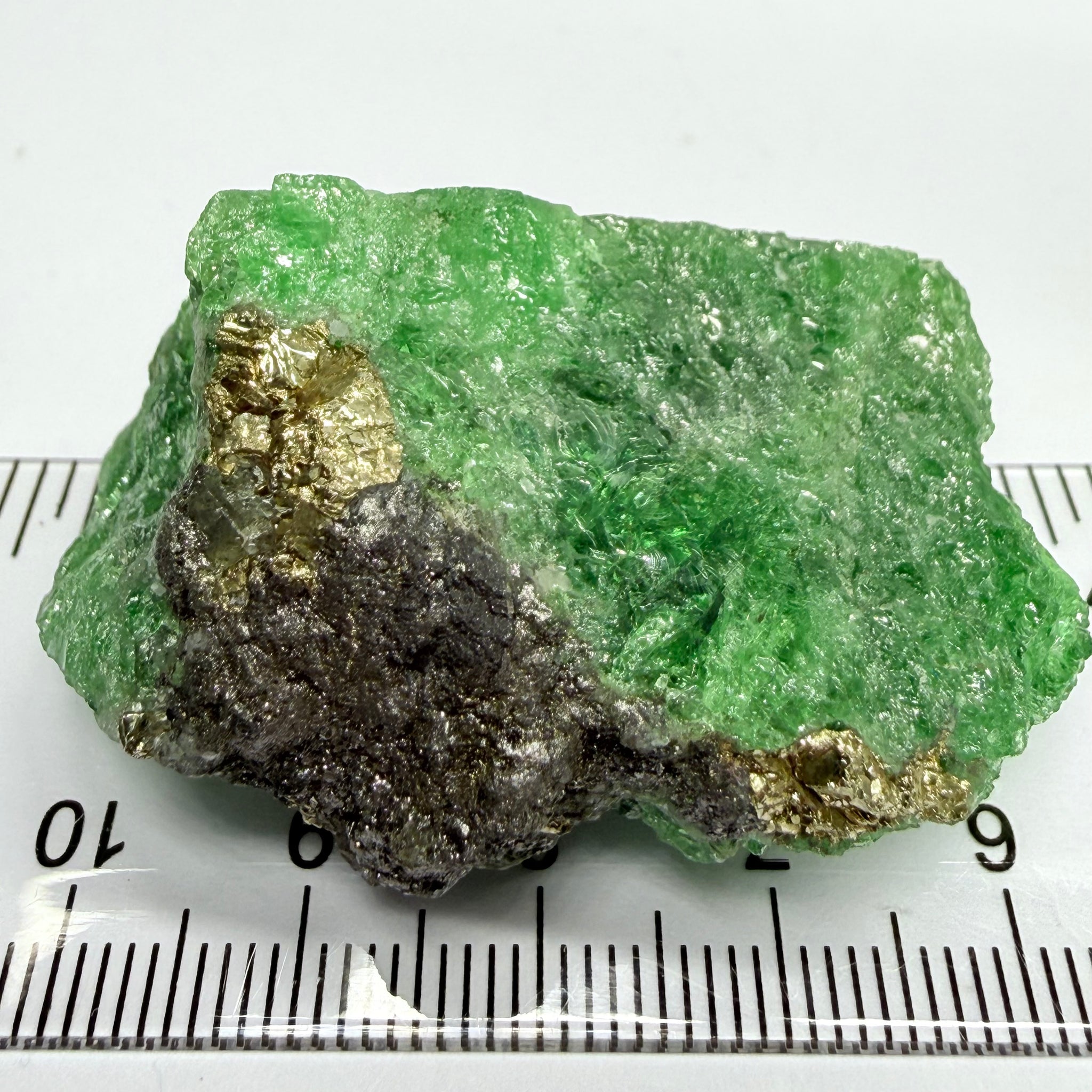 Tsavorite Crystal, Specimen Grade, 233.89ct, Merelani, Tanzania, Untreated Unheated, the flat standup portion is not sliced, it has natural etching on it and sits perfectly flat