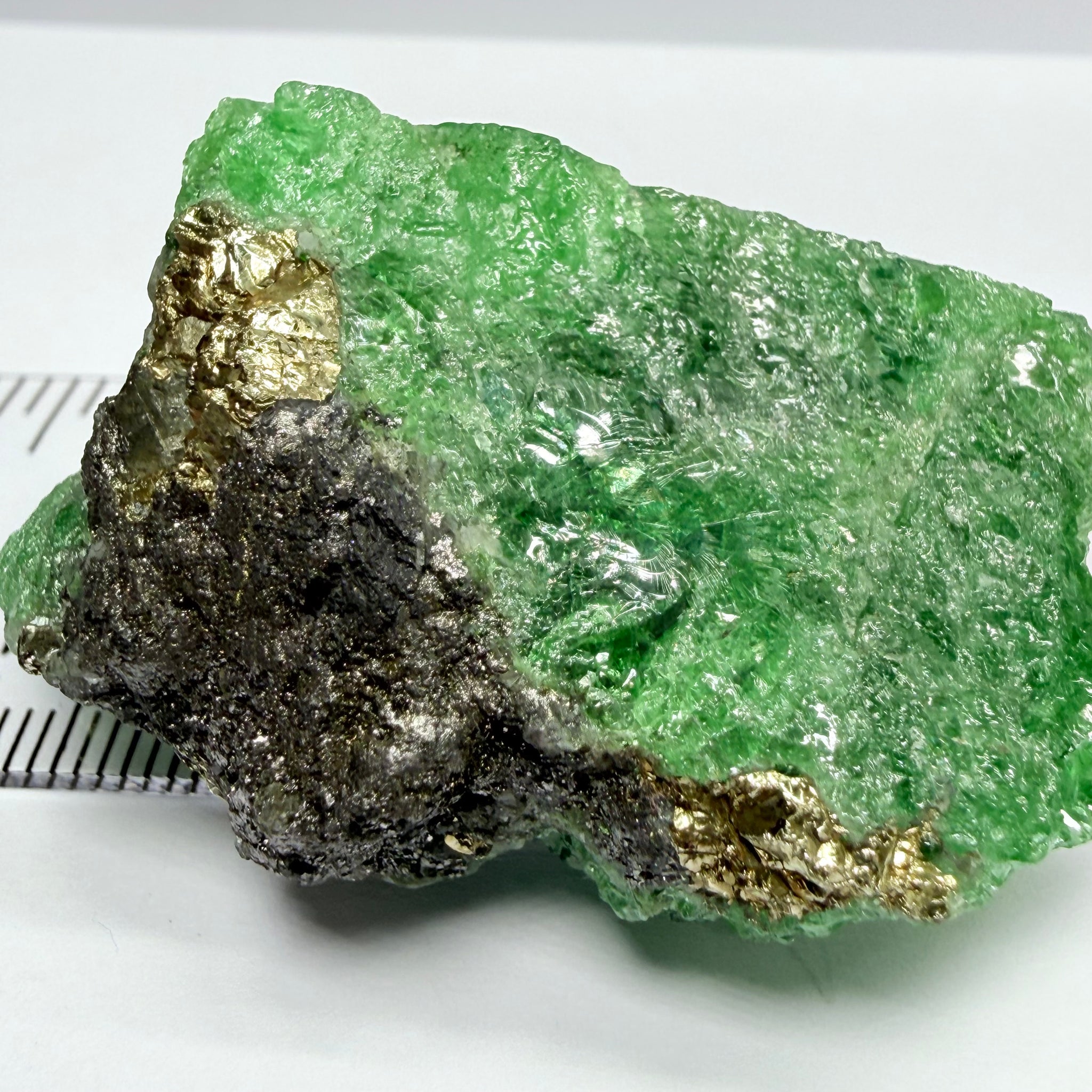 Tsavorite Crystal, Specimen Grade, 233.89ct, Merelani, Tanzania, Untreated Unheated, the flat standup portion is not sliced, it has natural etching on it and sits perfectly flat