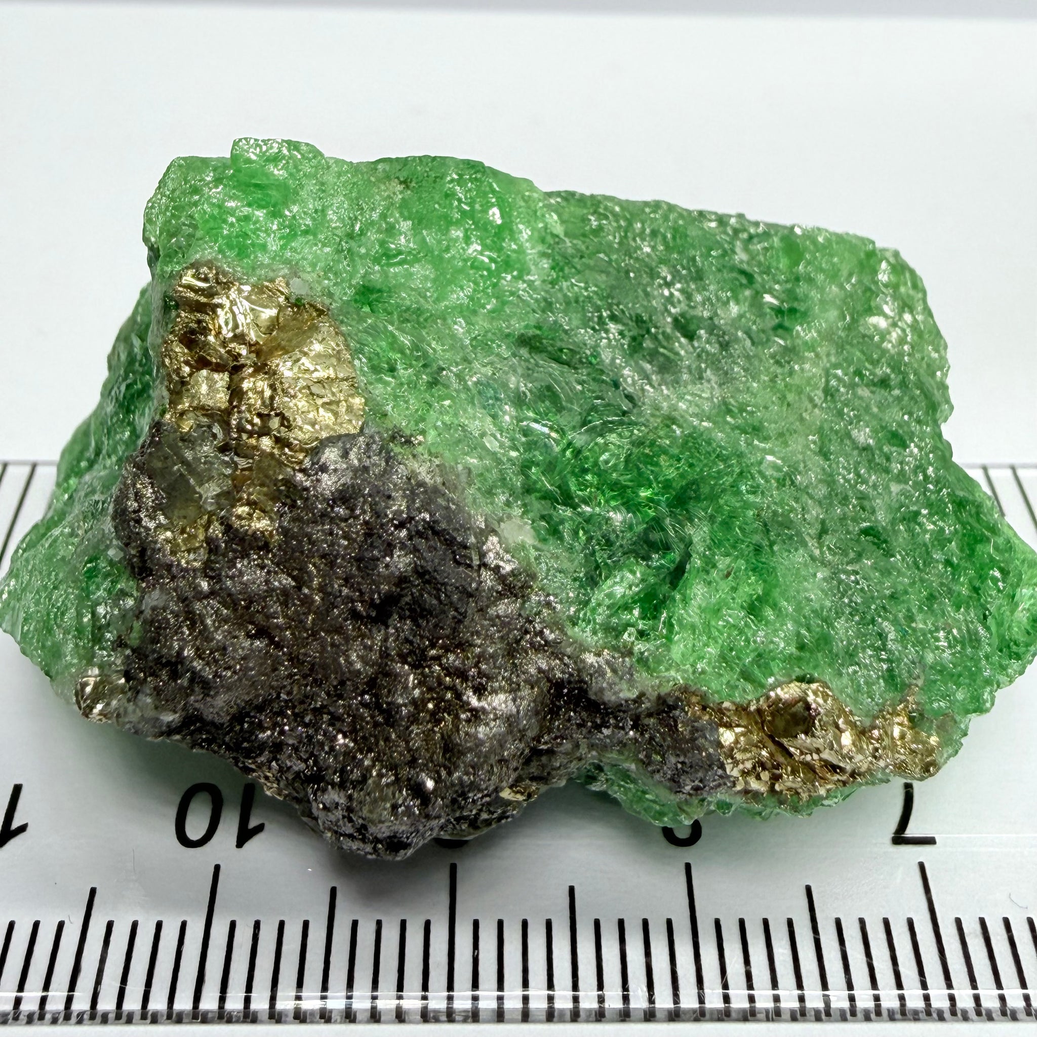Tsavorite Crystal, Specimen Grade, 233.89ct, Merelani, Tanzania, Untreated Unheated, the flat standup portion is not sliced, it has natural etching on it and sits perfectly flat