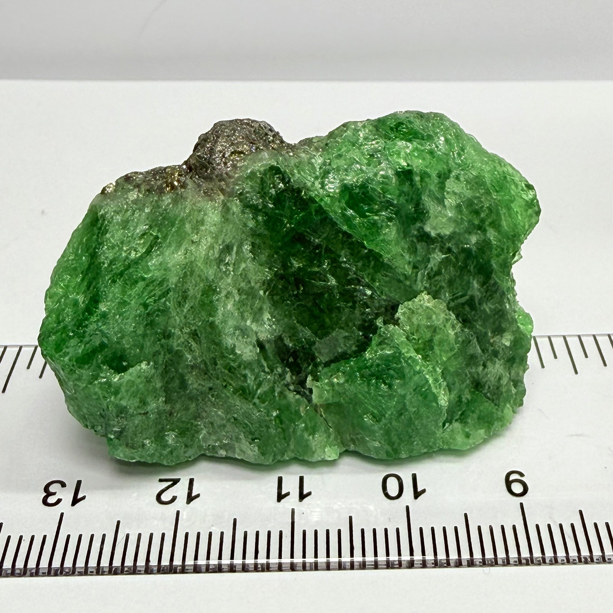 Tsavorite Crystal, Specimen Grade, 233.89ct, Merelani, Tanzania, Untreated Unheated, the flat standup portion is not sliced, it has natural etching on it and sits perfectly flat