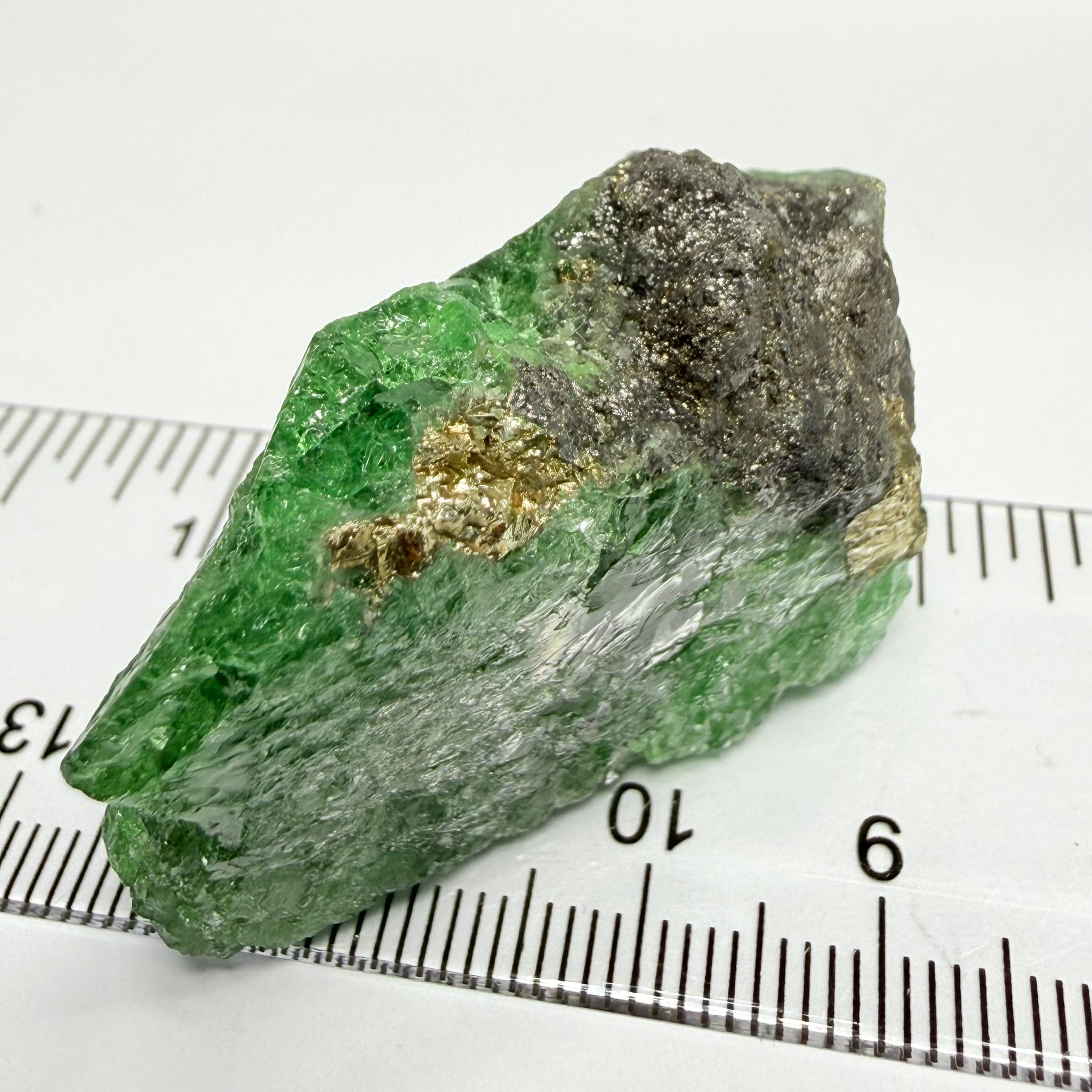 Tsavorite Crystal, Specimen Grade, 233.89ct, Merelani, Tanzania, Untreated Unheated, the flat standup portion is not sliced, it has natural etching on it and sits perfectly flat