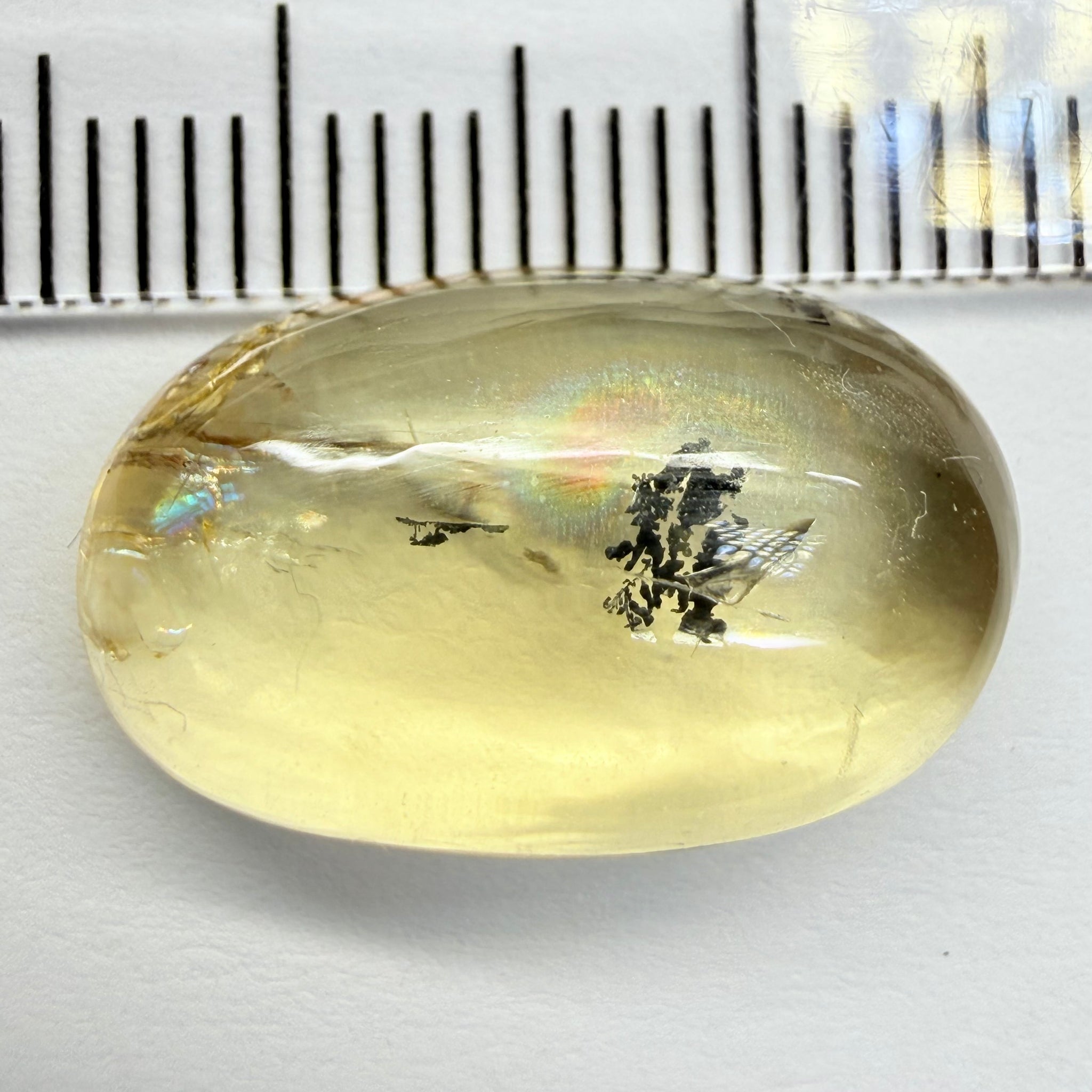 Golden Scapolite Cabochon with a dendrite, and a halo forming around the dendrite from a fracture, 11.53ct, Tanzania, Untreated Unheated