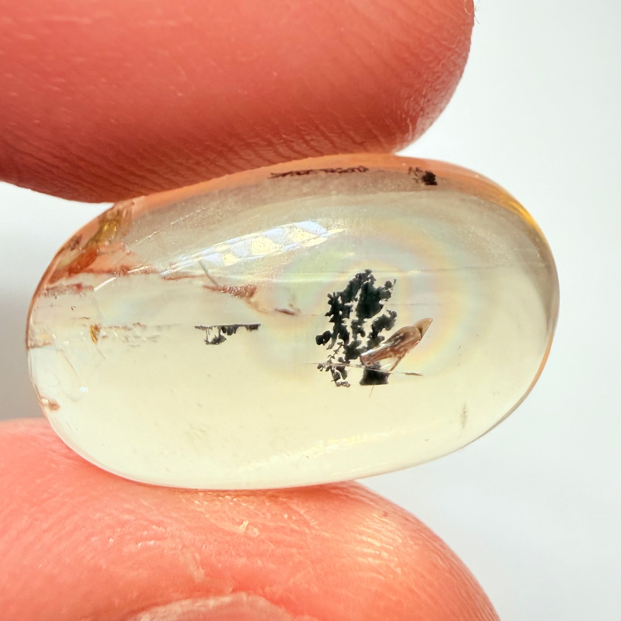 Golden Scapolite Cabochon with a dendrite, and a halo forming around the dendrite from a fracture, 11.53ct, Tanzania, Untreated Unheated