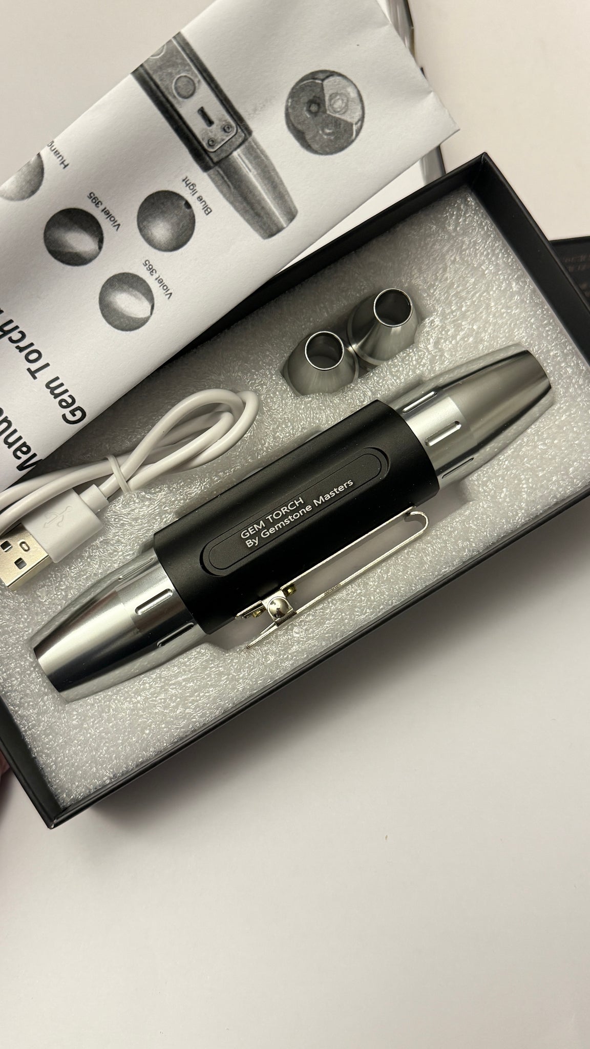 Gem Torch by Gemstone Masters, 6 function gem torch, strong power UV 365nm and 395nm, belt clip and 2 light focusing cones, 98% cri white bulb, 2-year warranty (excluding damage or wear and tear), we are the agents for this. Ships worldwide