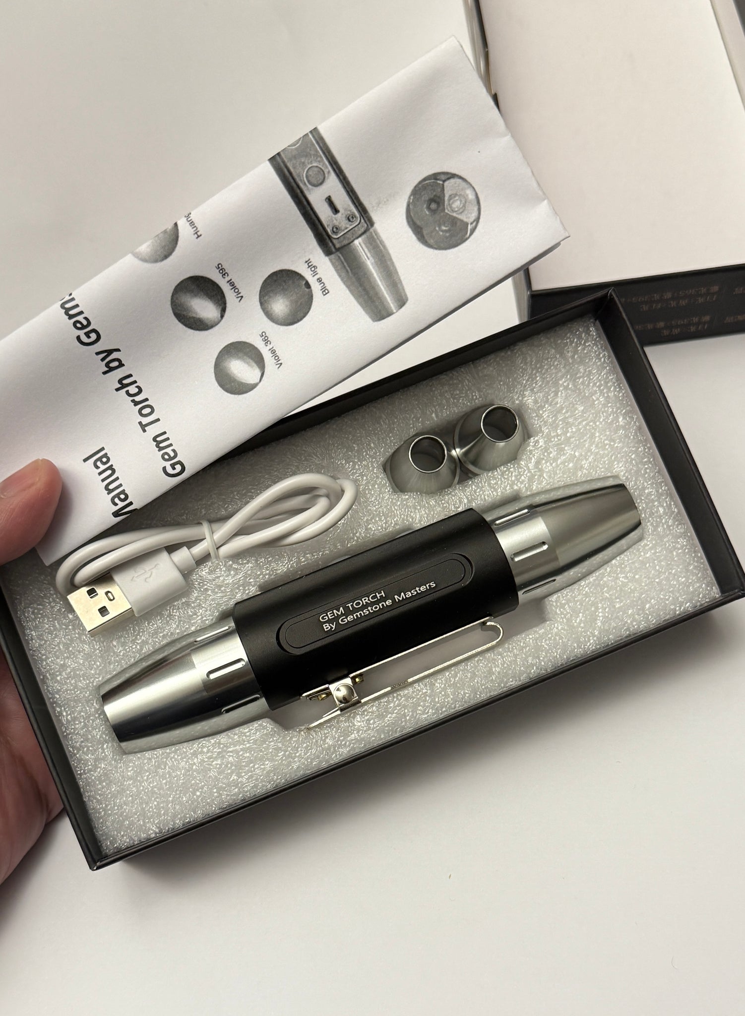 Gem Torch by Gemstone Masters, 6 function gem torch, strong power UV 365nm and 395nm, belt clip and 2 light focusing cones, 98% cri white bulb, 2-year warranty (excluding damage or wear and tear), we are the agents for this. Ships worldwide