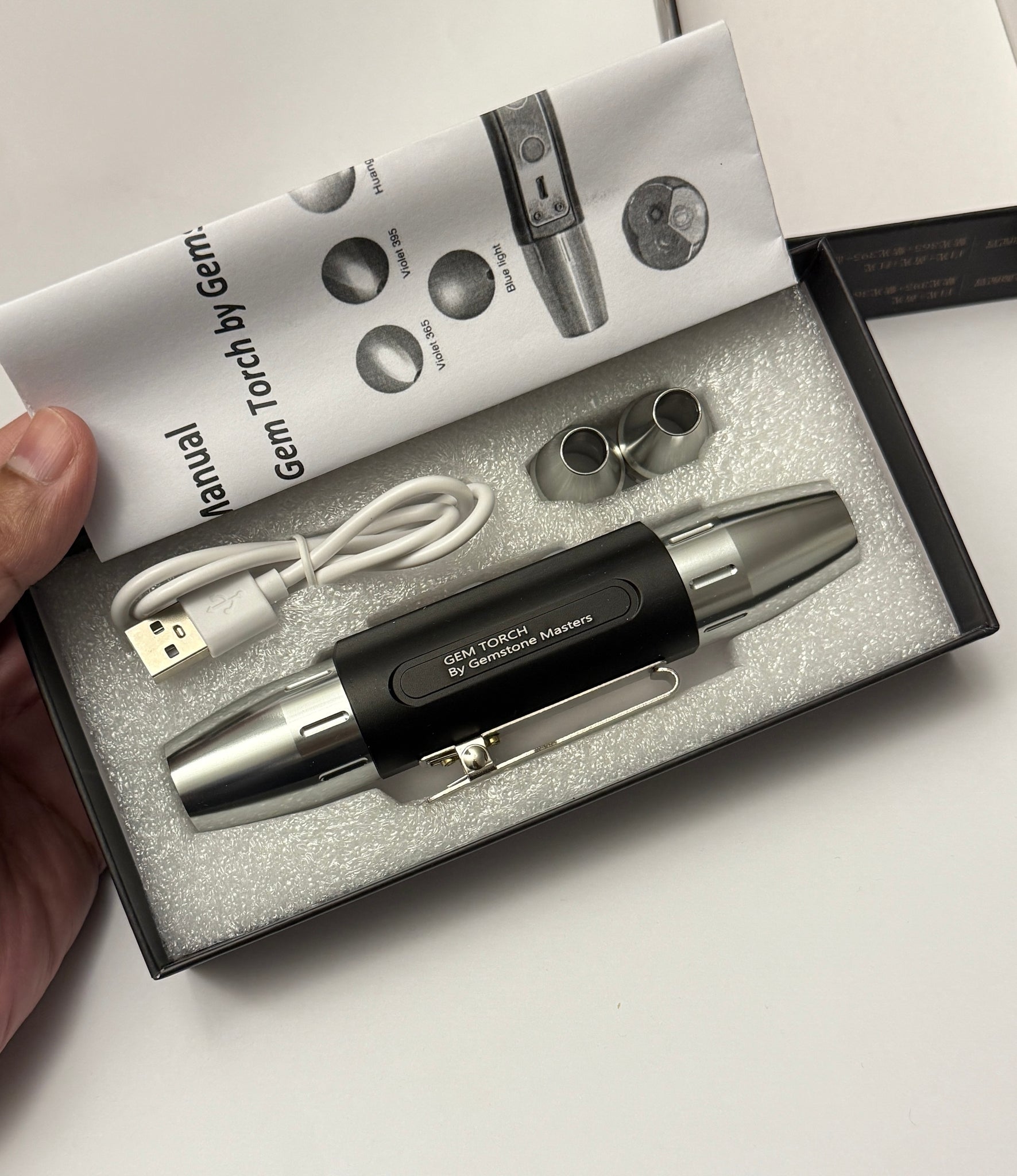 Gem Torch by Gemstone Masters, 6 function gem torch, strong power UV 365nm and 395nm, belt clip and 2 light focusing cones, 98% cri white bulb, 2-year warranty (excluding damage or wear and tear), we are the agents for this. Ships worldwide