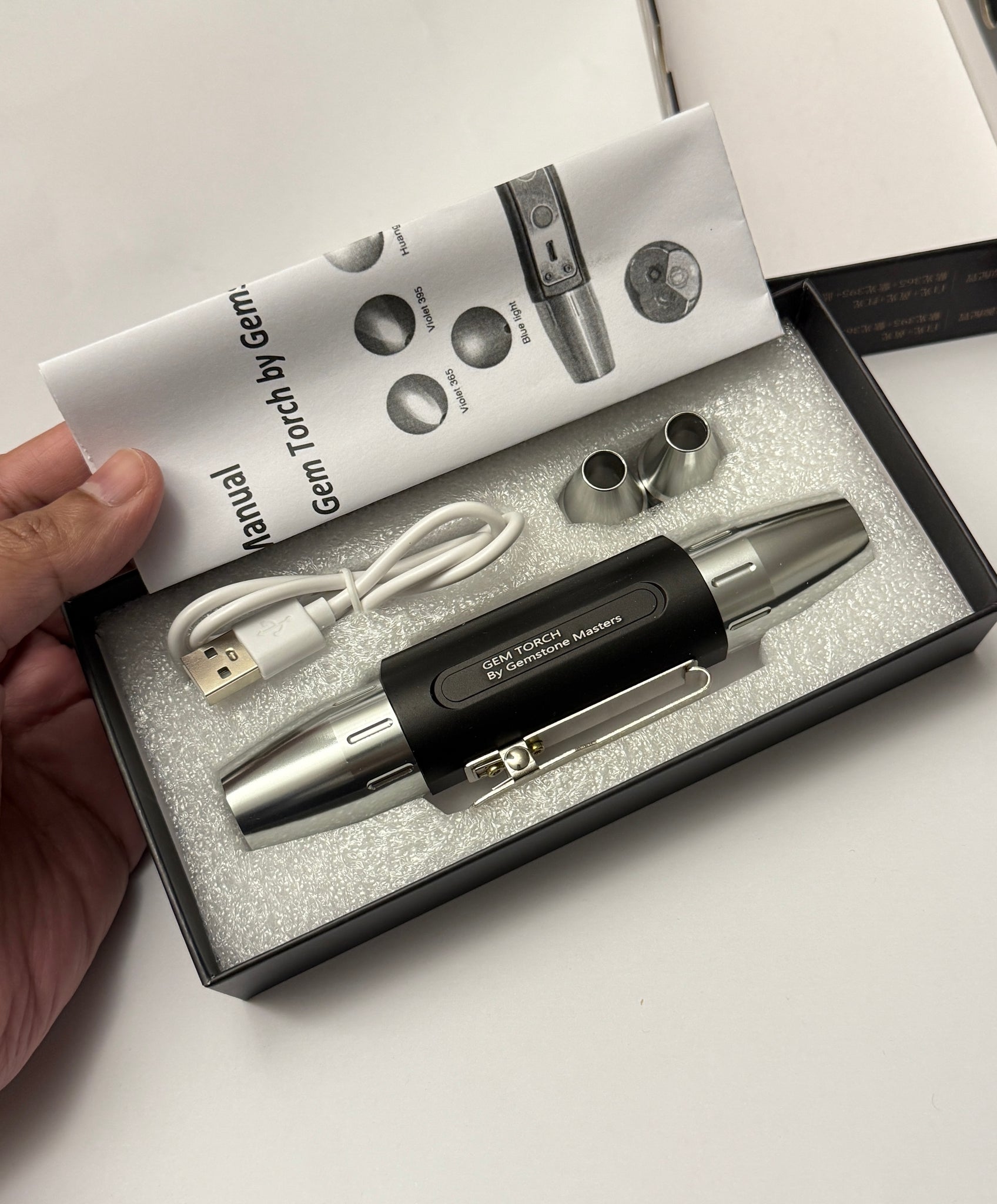 Gem Torch by Gemstone Masters, 6 function gem torch, strong power UV 365nm and 395nm, belt clip and 2 light focusing cones, 98% cri white bulb, 2-year warranty (excluding damage or wear and tear), we are the agents for this. Ships worldwide