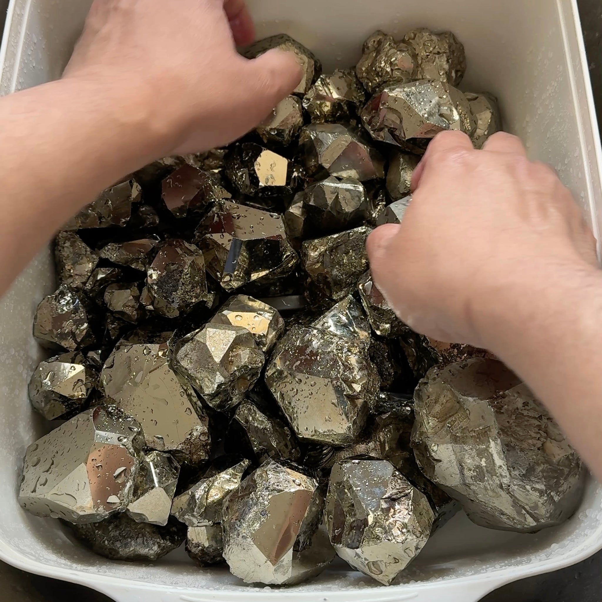Mirror Shine Pyrite Lot from Merelani Tanzania. These that come from Merelani, show a high, natural mirror finish on the facets, without polishing, these have come out of the ground like this, shown wet, they can be faceted, the lot is 11.10 kilo