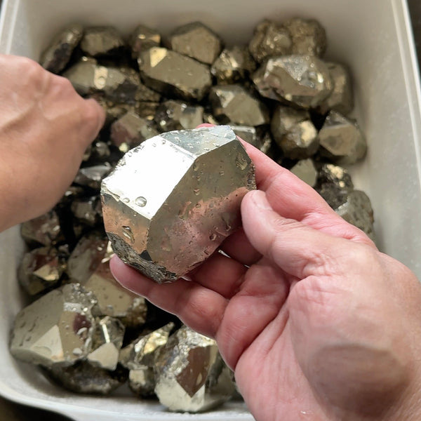 Mirror Shine Pyrite Lot from Merelani Tanzania. These that come from Merelani, show a high, natural mirror finish on the facets, without polishing, these have come out of the ground like this, shown wet, they can be faceted, the lot is 11.10 kilo