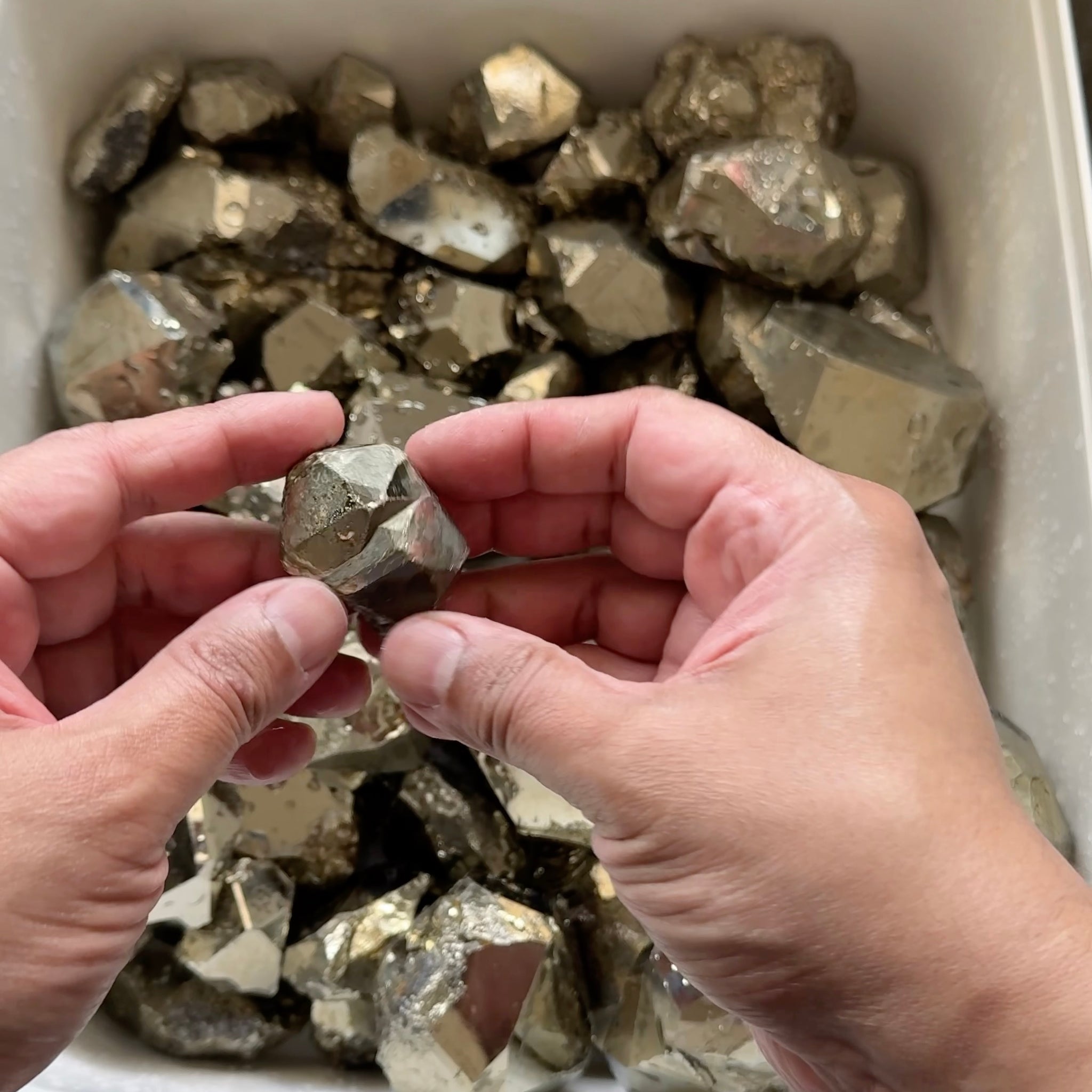 Mirror Shine Pyrite Lot from Merelani Tanzania. These that come from Merelani, show a high, natural mirror finish on the facets, without polishing, these have come out of the ground like this, shown wet, they can be faceted, the lot is 11.10 kilo