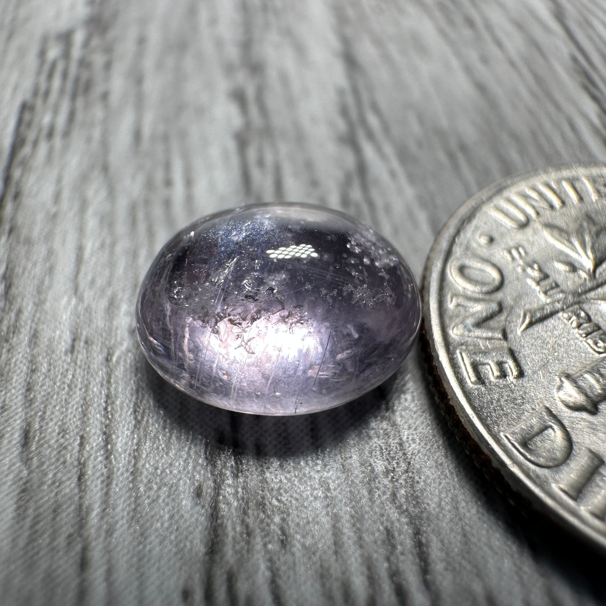 Sapphire Cabochon, 3.49ct, Umba Valley, Tanzania. Untreated Unheated. Yes that's a moving spot caused by silk positioning!