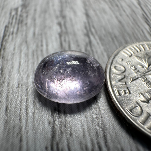 Sapphire Cabochon, 3.49ct, Umba Valley, Tanzania. Untreated Unheated. Yes that's a moving spot caused by silk positioning!