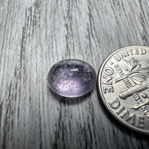 Sapphire Cabochon, 3.49ct, Umba Valley, Tanzania. Untreated Unheated. Yes that's a moving spot caused by silk positioning!