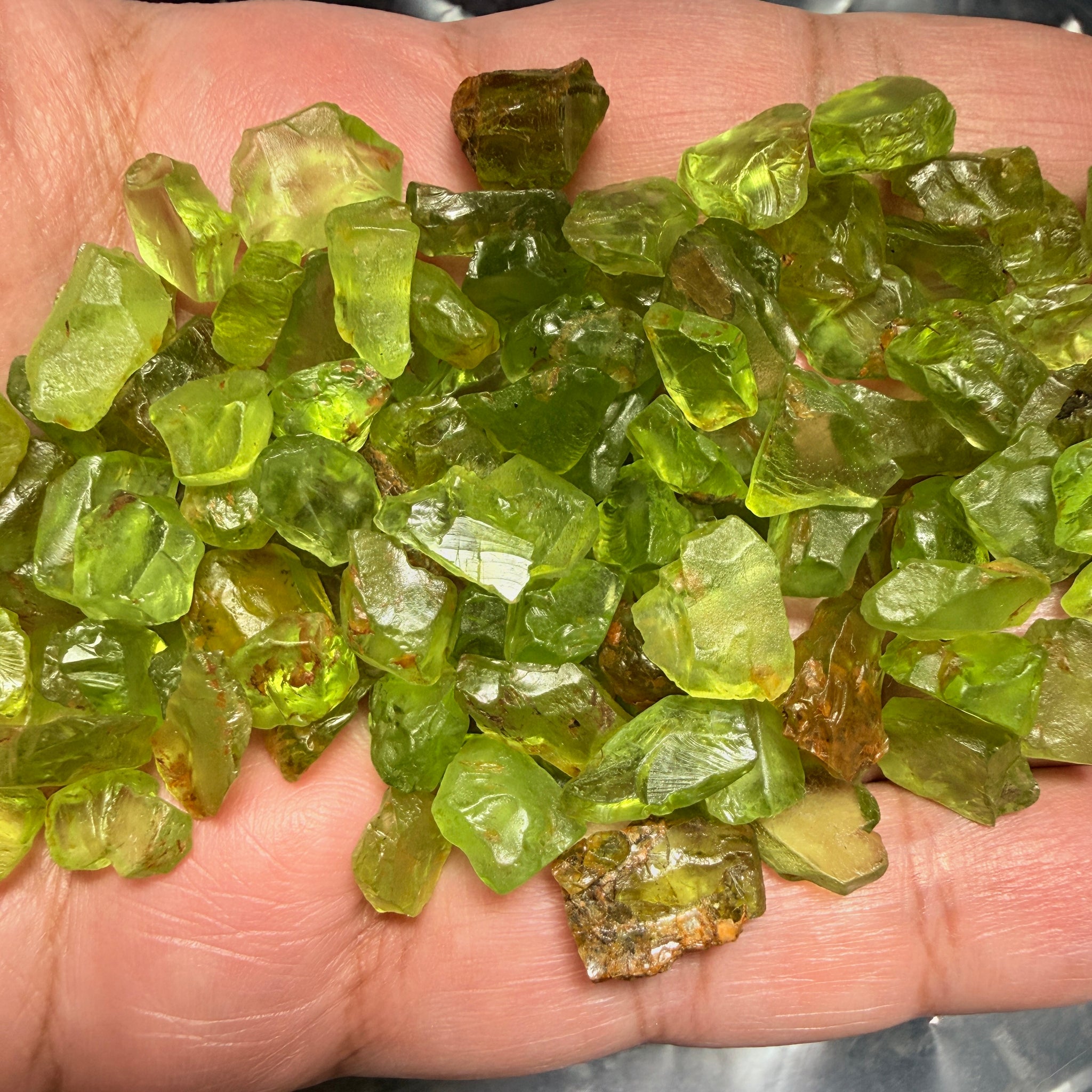 GoGo Peridot Lot, 111.50gm (557.50ct), Tanzania, mixed grades, clarities and shapes