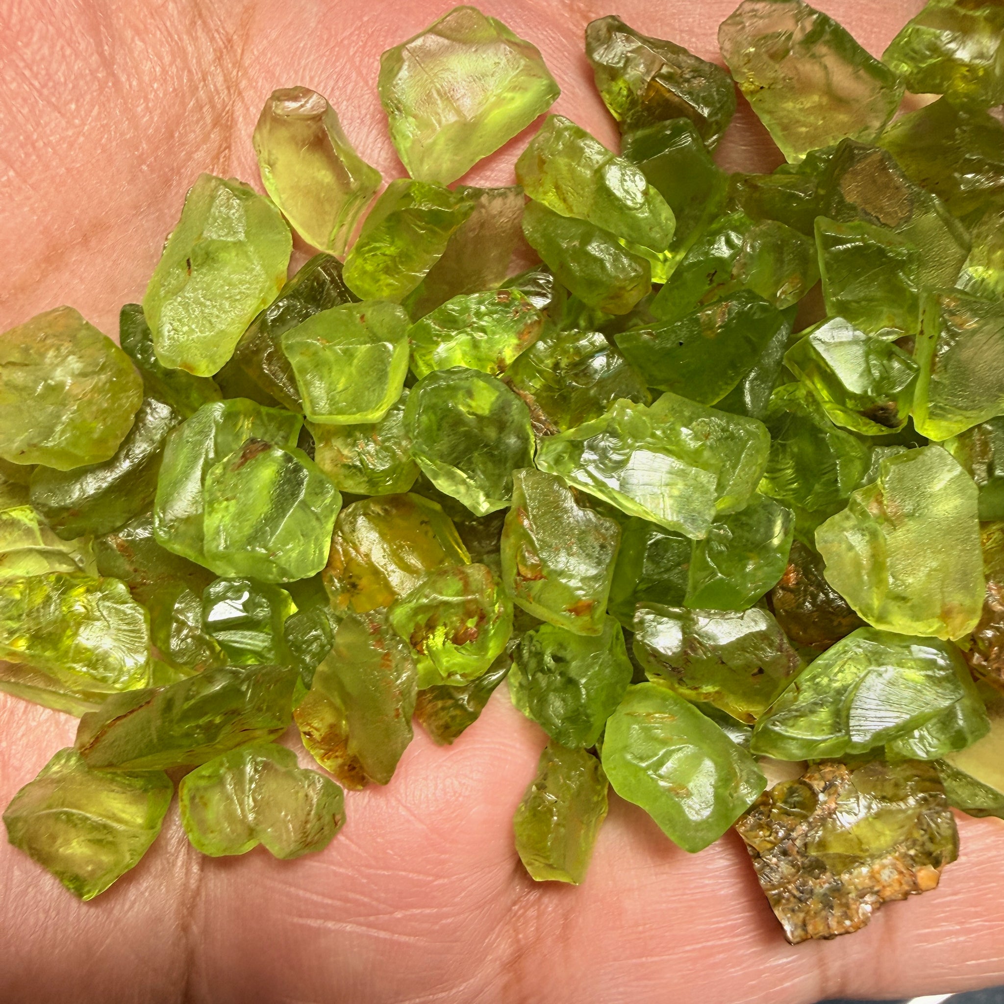 GoGo Peridot Lot, 111.50gm (557.50ct), Tanzania, mixed grades, clarities and shapes