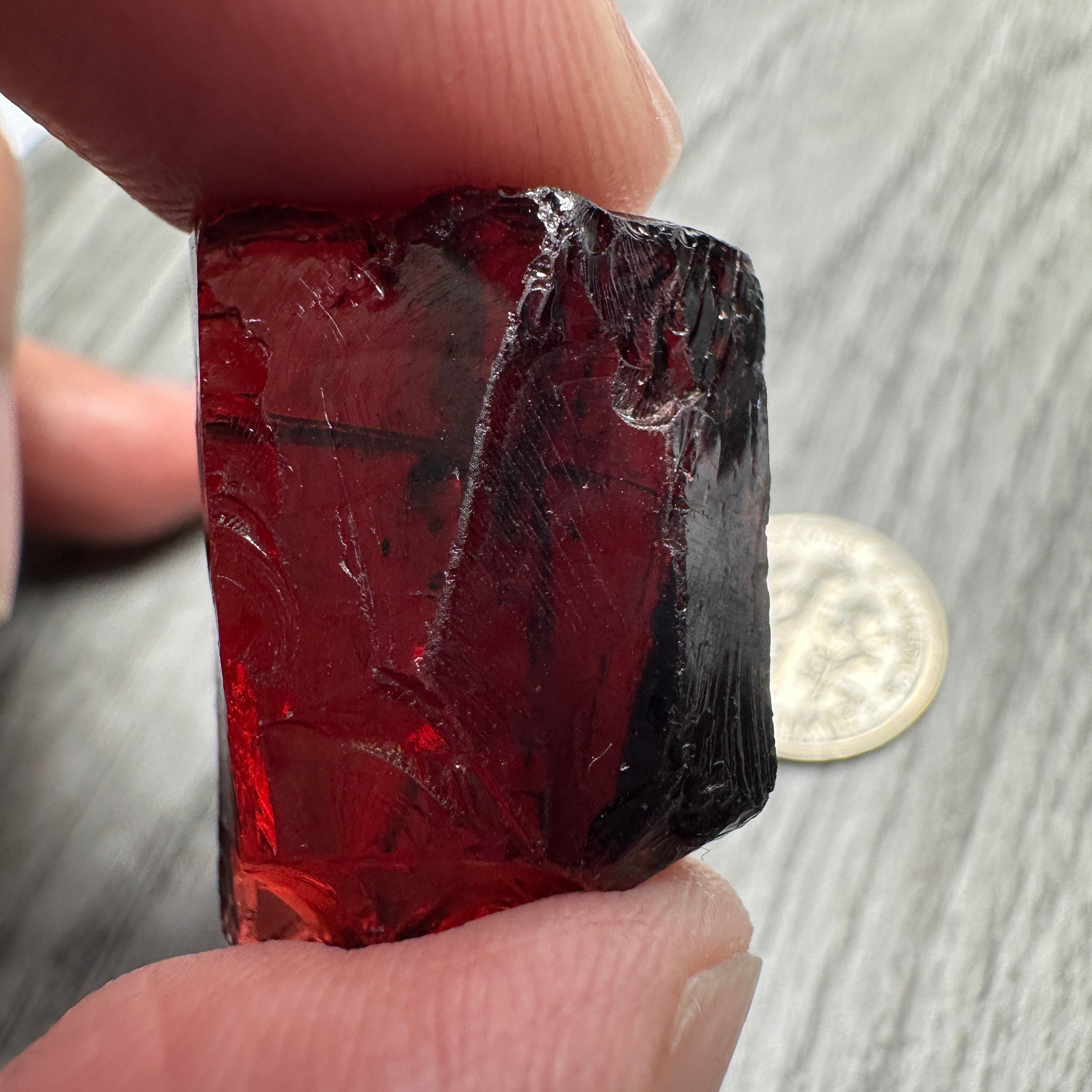 54.70ct Umba Garnet, Tanzania, dividing crack rest clean with only a couple of black spots, Untreated Unheated