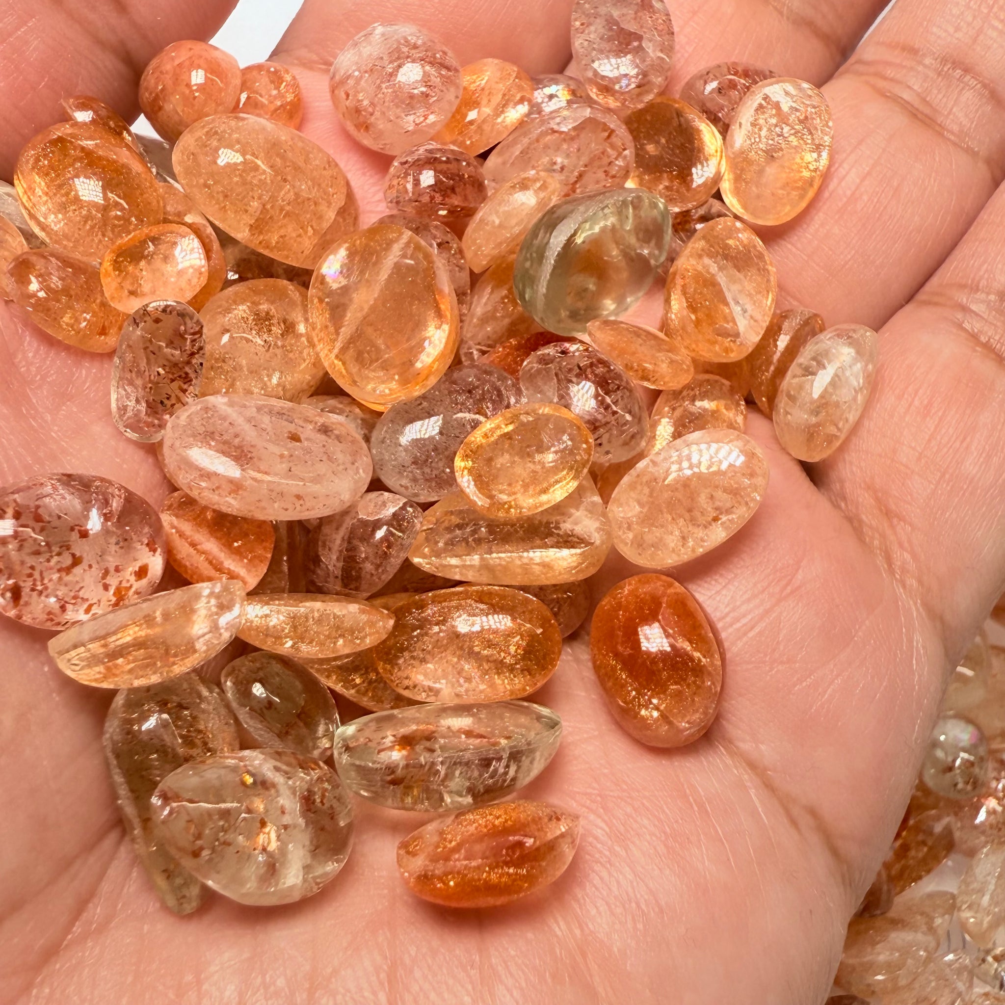 Wholesale Sunstone Cab Lot, flat backed cabs, 228gm / 1140ct, Comminly called Maasai Confetti Sunstone, Tanzania, Untreated Unheated, photos and vids in different lights, see how they look