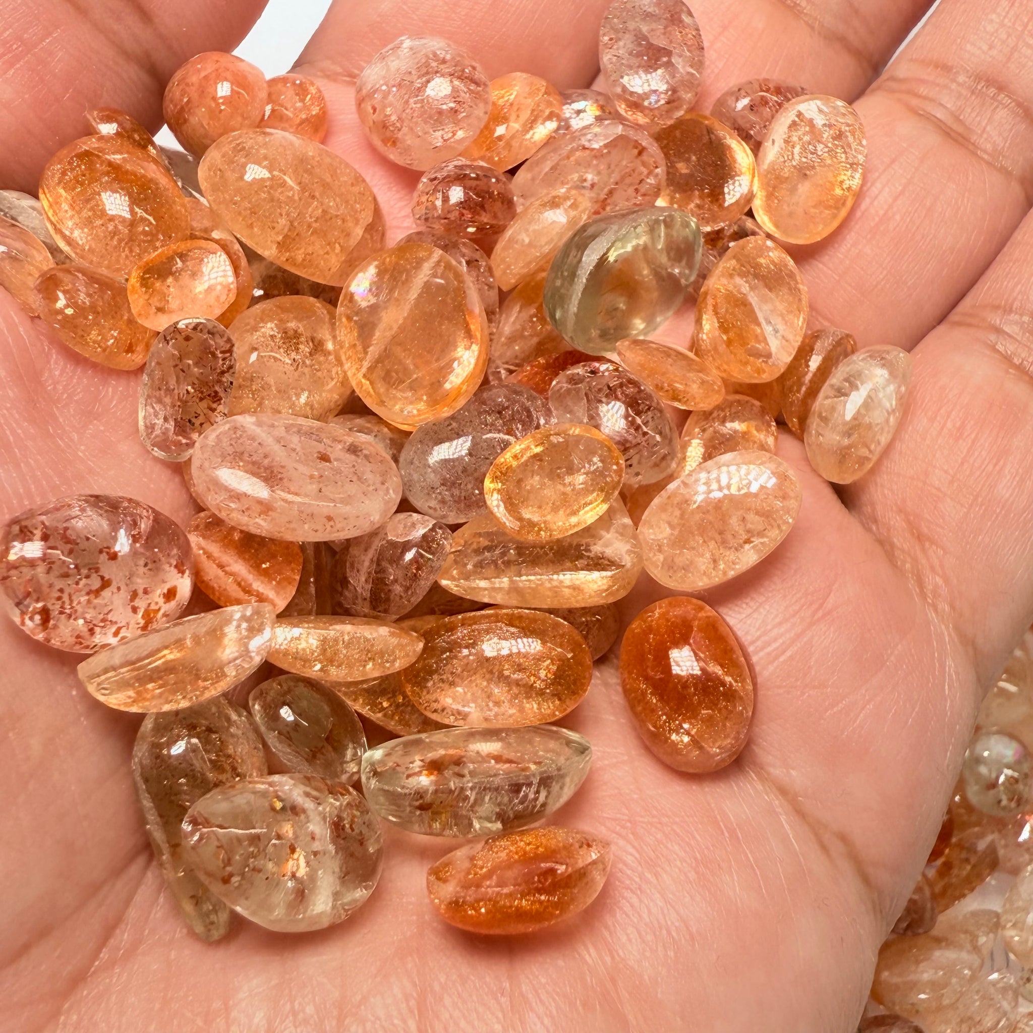 Wholesale Sunstone Cab Lot, flat backed cabs, 228gm / 1140ct, Comminly called Maasai Confetti Sunstone, Tanzania, Untreated Unheated, photos and vids in different lights, see how they look