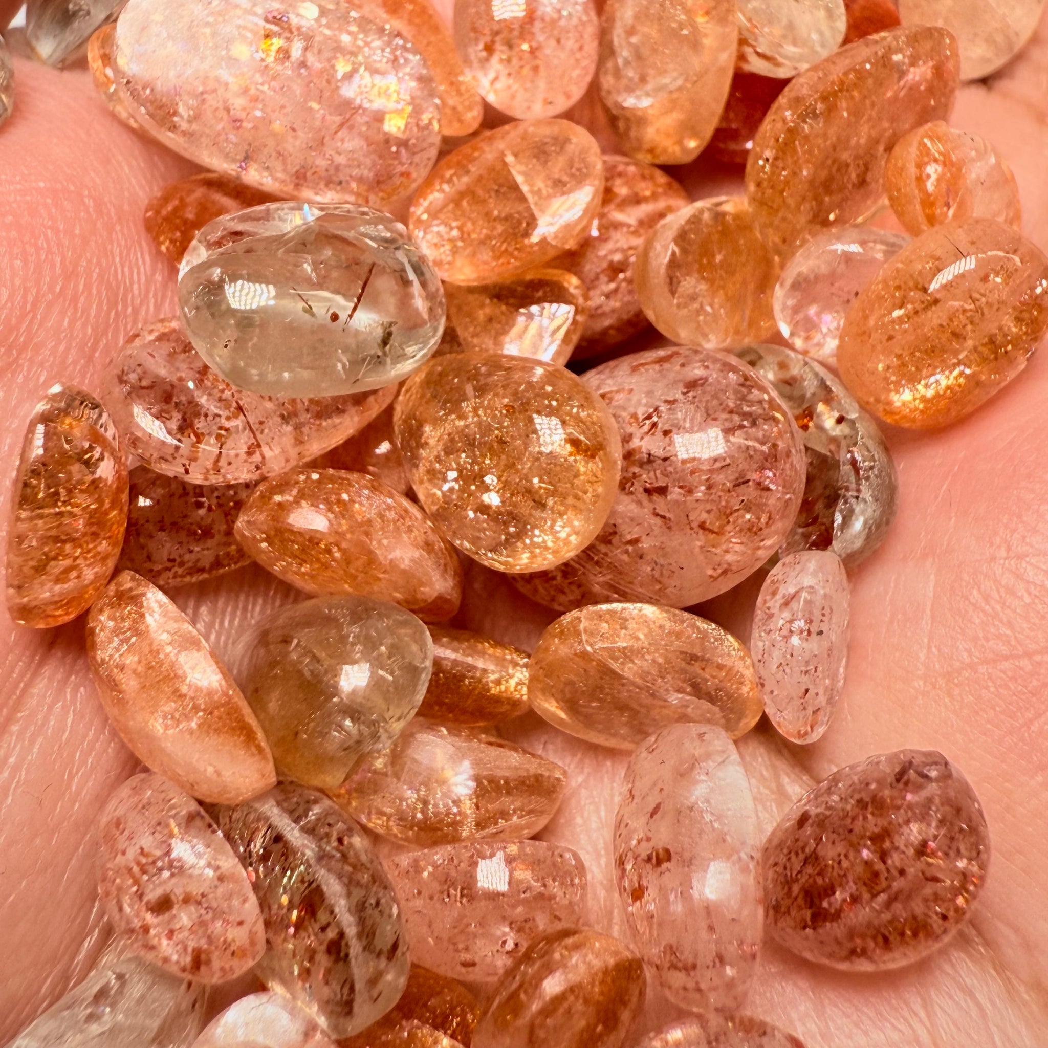 Wholesale Sunstone Cab Lot, flat backed cabs, 228gm / 1140ct, Comminly called Maasai Confetti Sunstone, Tanzania, Untreated Unheated, photos and vids in different lights, see how they look
