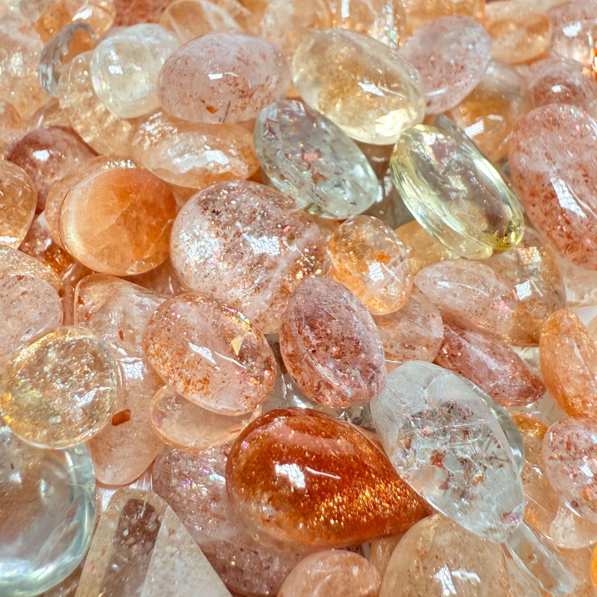 Wholesale Sunstone Cab Lot, flat backed cabs, 228gm / 1140ct, Comminly called Maasai Confetti Sunstone, Tanzania, Untreated Unheated, photos and vids in different lights, see how they look