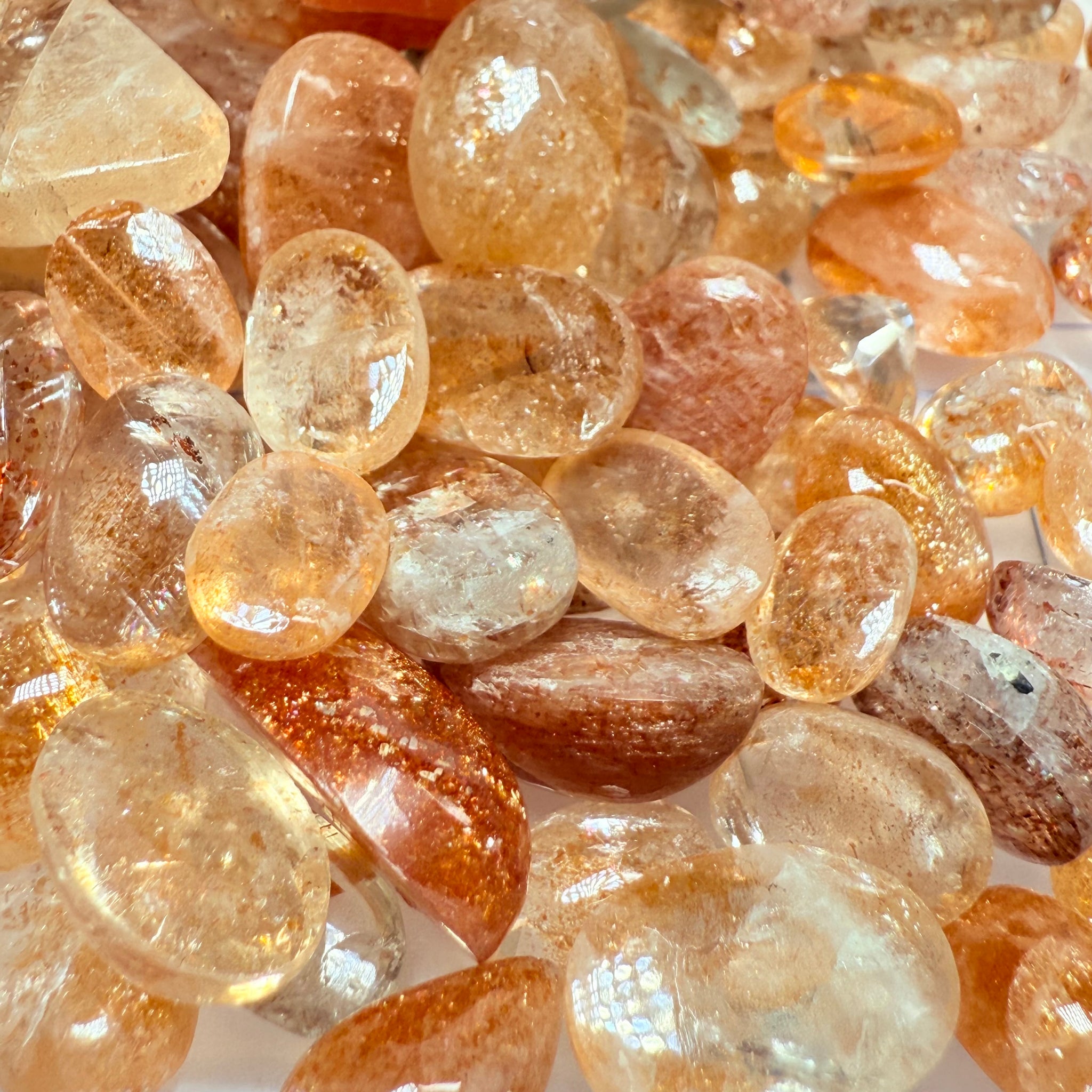 Wholesale Sunstone Cab Lot, flat backed cabs, 228gm / 1140ct, Comminly called Maasai Confetti Sunstone, Tanzania, Untreated Unheated, photos and vids in different lights, see how they look