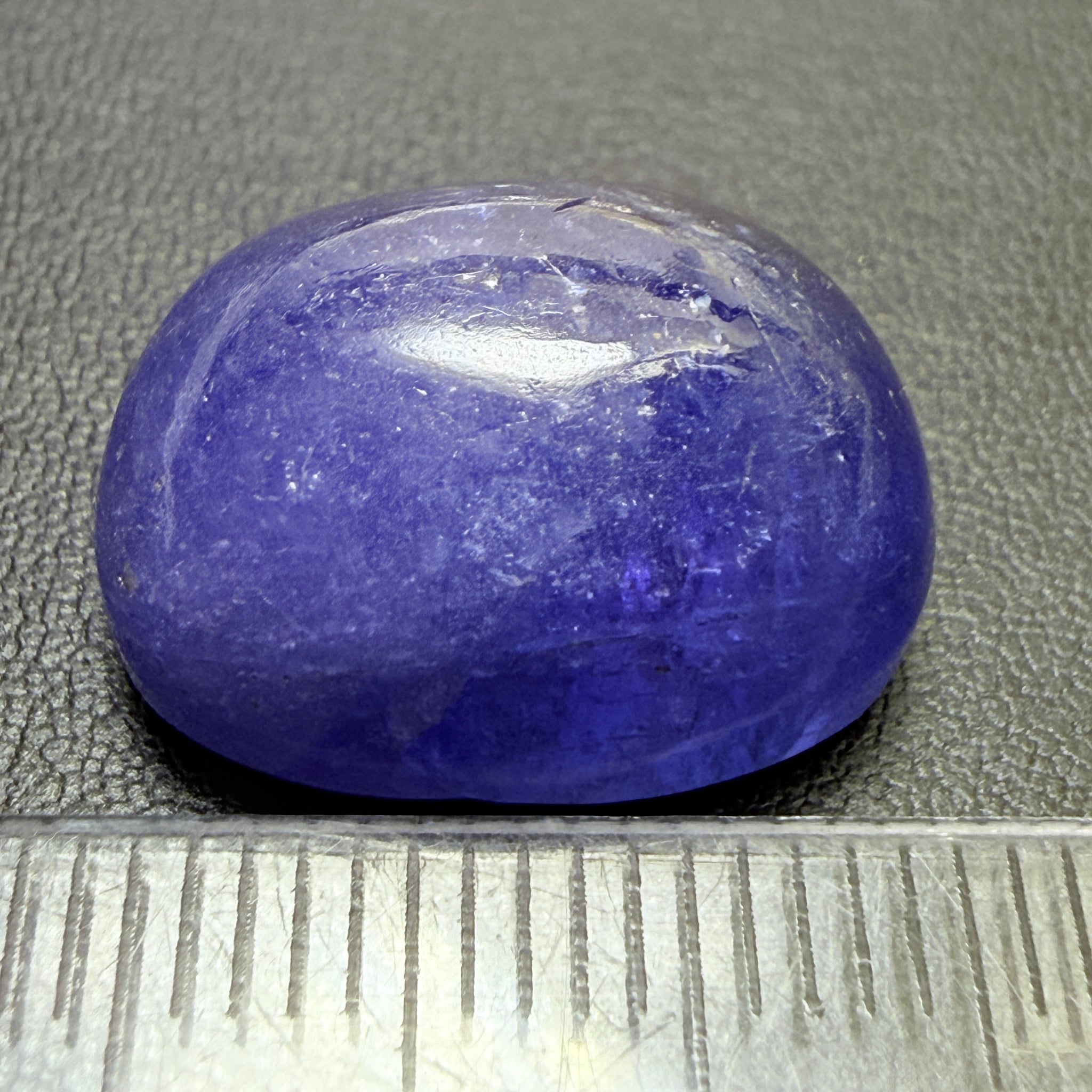 Tanzanite Cabochon, 19.38ct, Merelani, Tanzania, Gently Heated, nice gemmy portion on the side