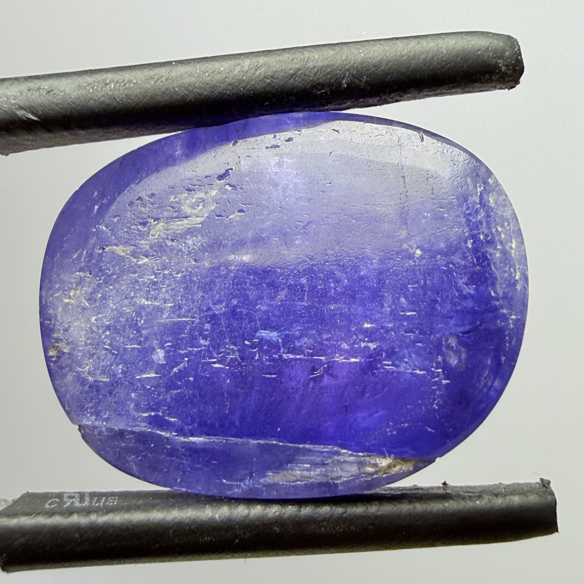 Tanzanite Cabochon, 19.38ct, Merelani, Tanzania, Gently Heated, nice gemmy portion on the side