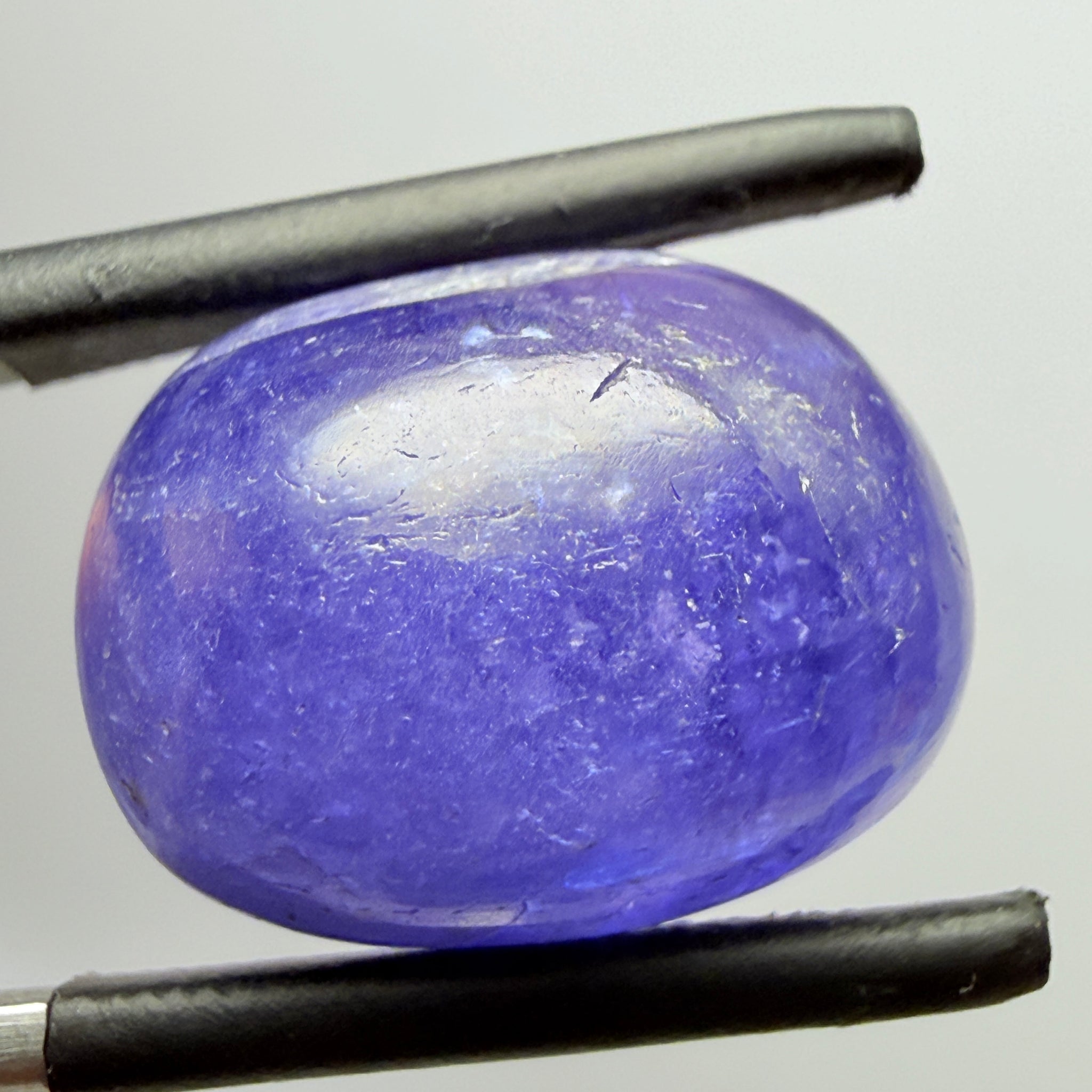 Tanzanite Cabochon, 19.38ct, Merelani, Tanzania, Gently Heated, nice gemmy portion on the side