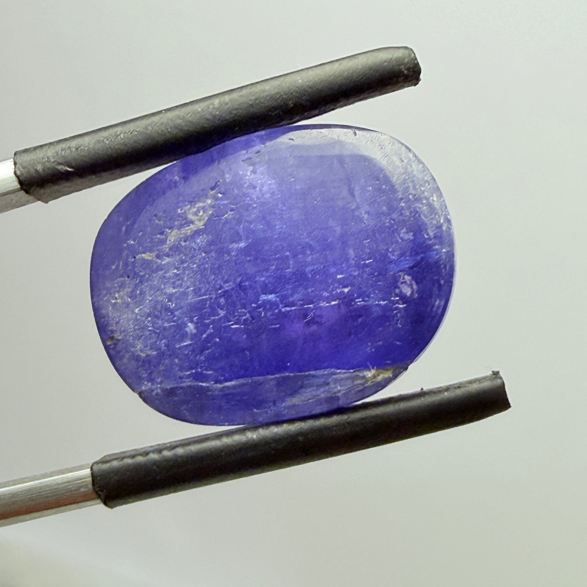 Tanzanite Cabochon, 19.38ct, Merelani, Tanzania, Gently Heated, nice gemmy portion on the side