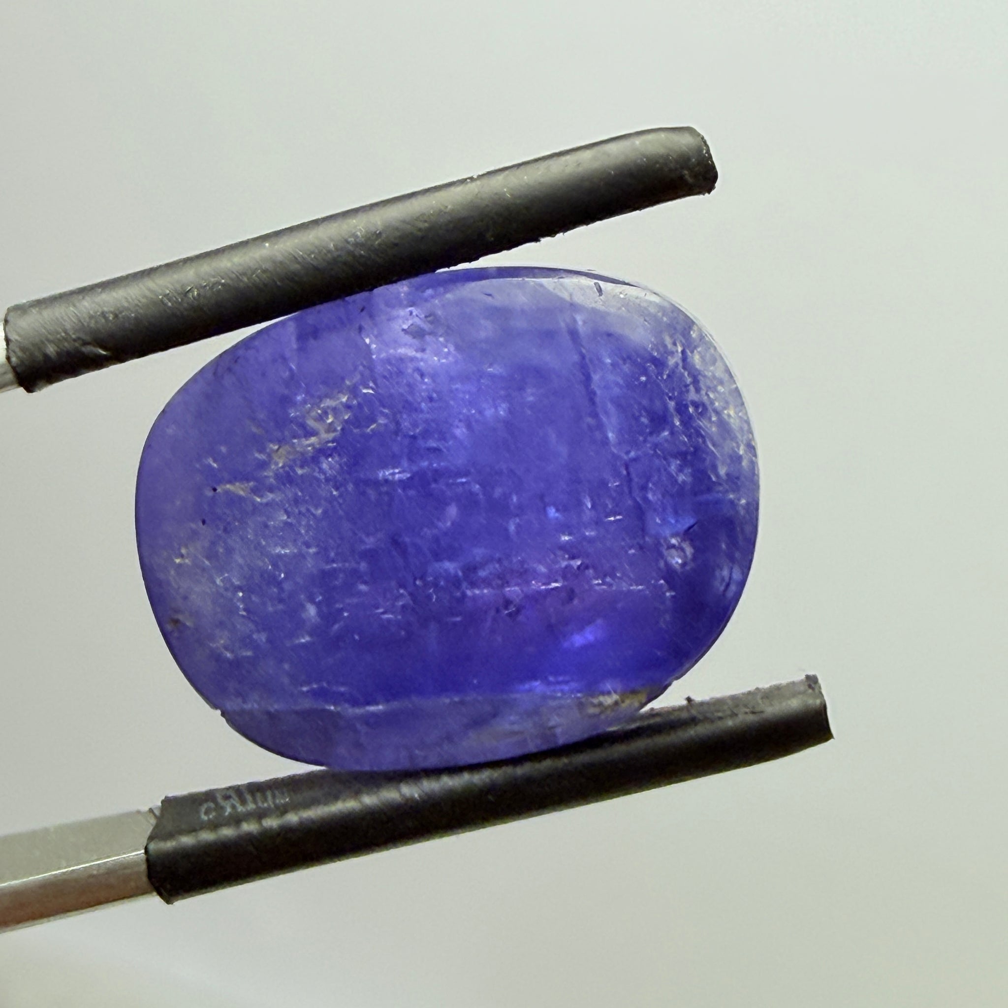 Tanzanite Cabochon, 19.38ct, Merelani, Tanzania, Gently Heated, nice gemmy portion on the side