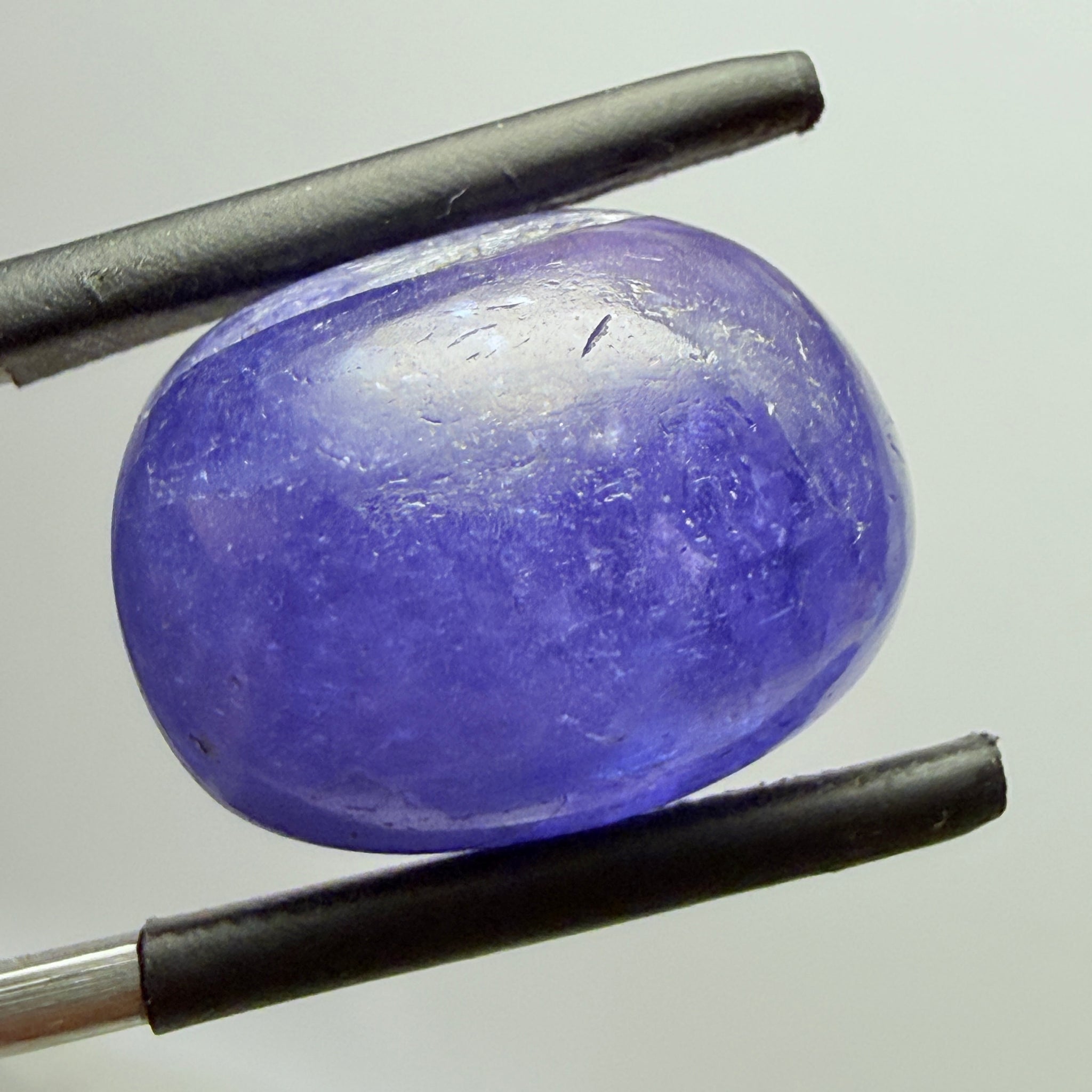 Tanzanite Cabochon, 19.38ct, Merelani, Tanzania, Gently Heated, nice gemmy portion on the side
