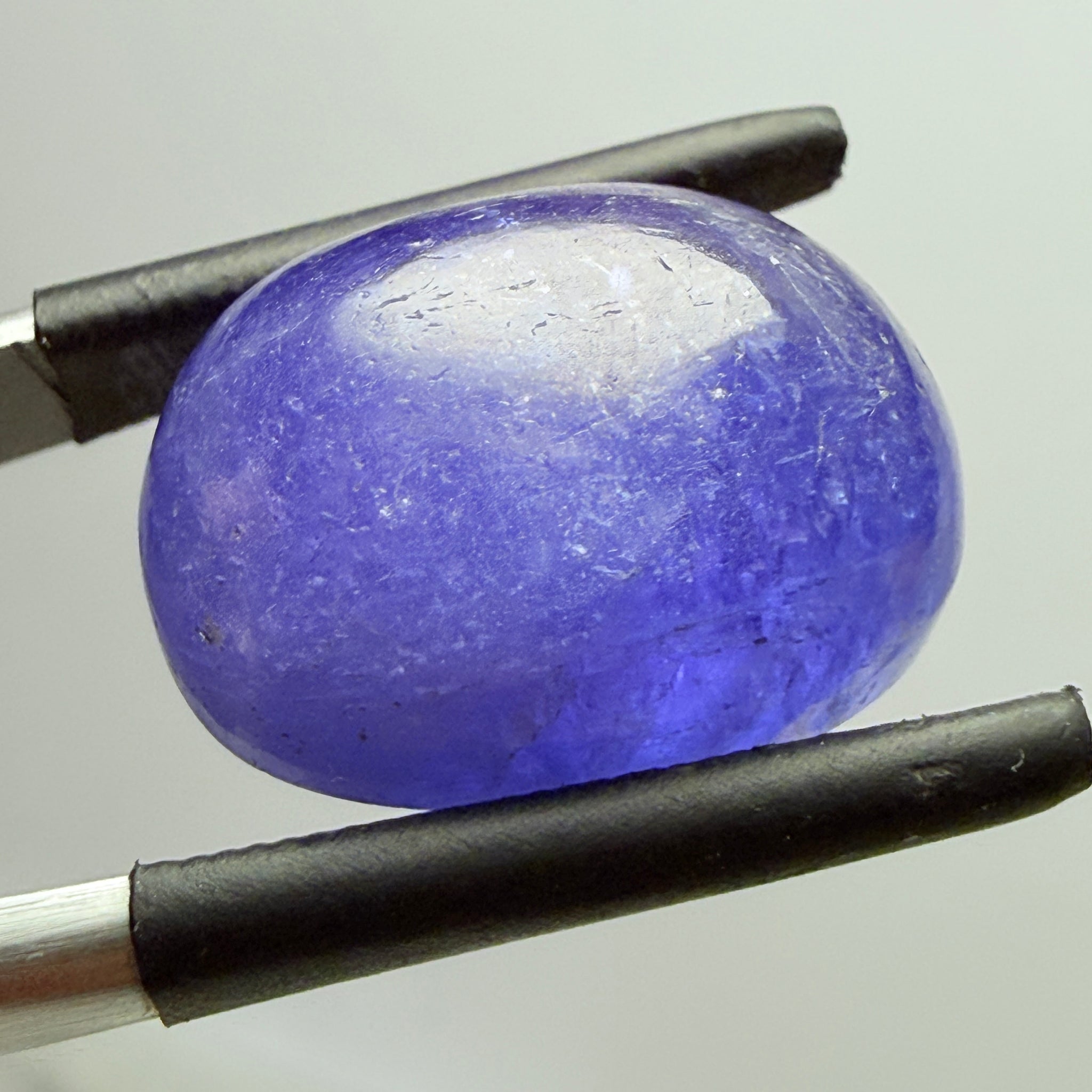 Tanzanite Cabochon, 19.38ct, Merelani, Tanzania, Gently Heated, nice gemmy portion on the side