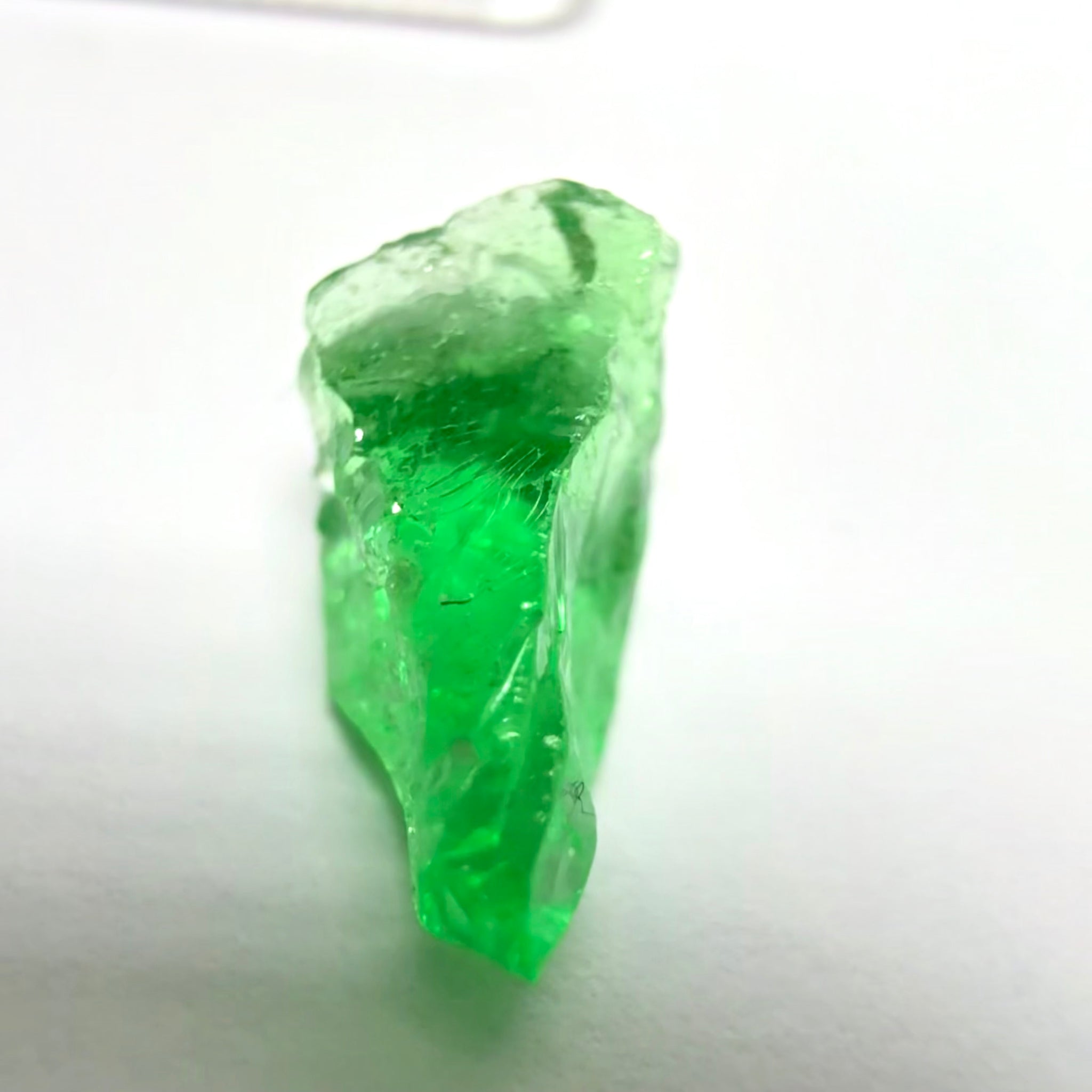 Tsavorite Garnet, 2.67ct, Tanzania, Untreated Unheated. Slight veils inside, really bad shape for faceting