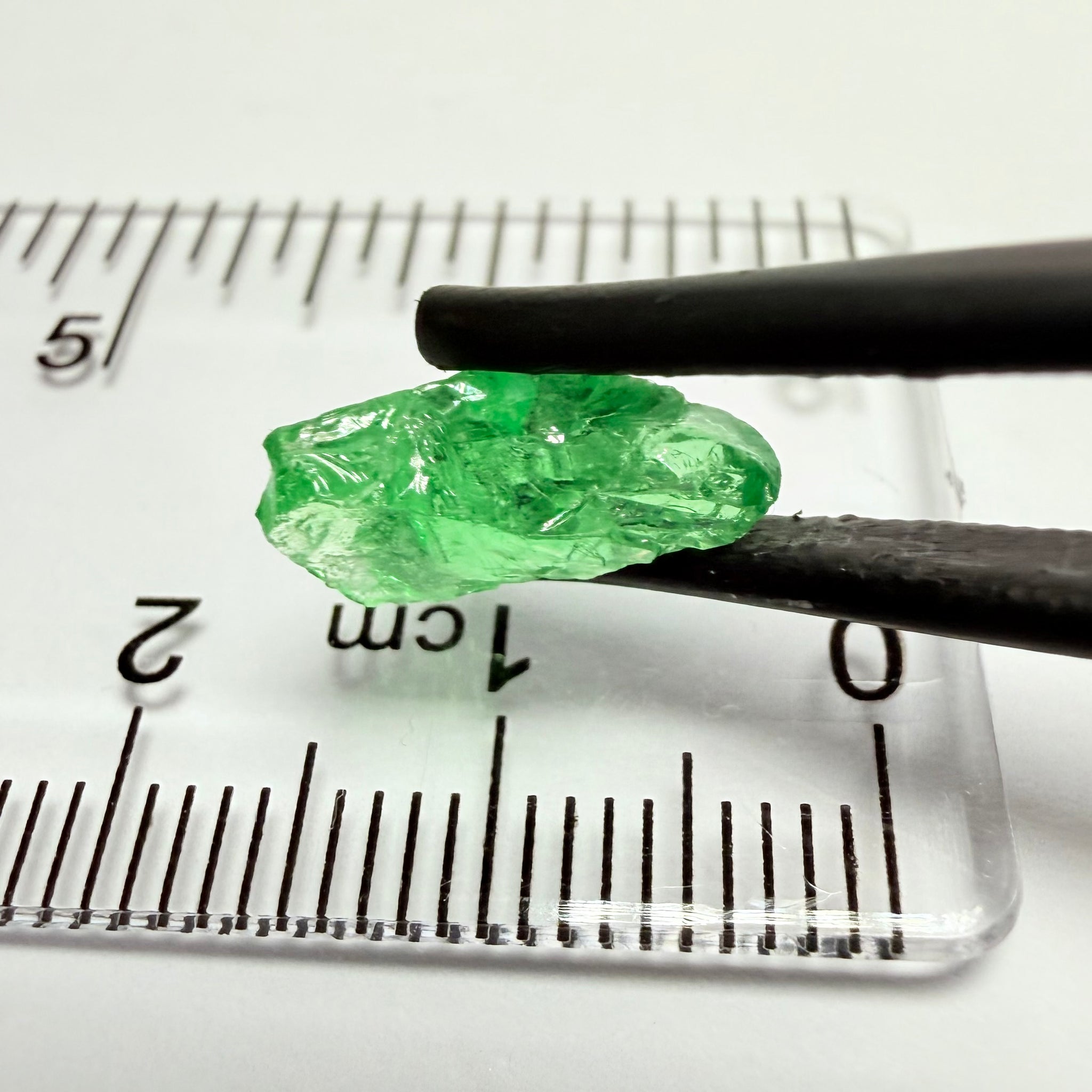 Tsavorite Garnet, 2.67ct, Tanzania, Untreated Unheated. Slight veils inside, really bad shape for faceting
