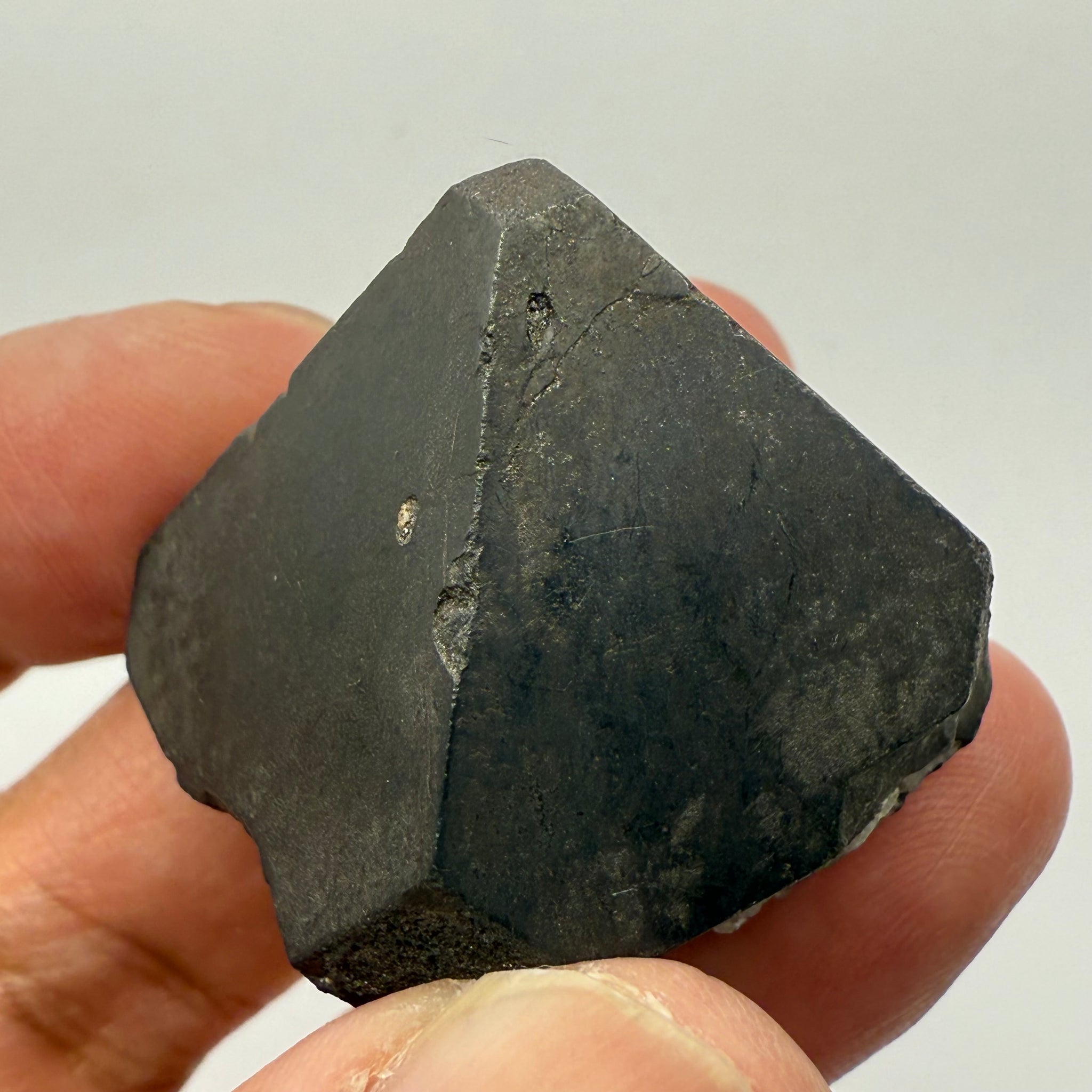 Alabandite Crystal, Merelani, same mining pit as Tanzanite, comes out with Tanzanite, Tanzania, Untreated Unheated. 53.50gm 30.60 x 34.9 x 31.7mm