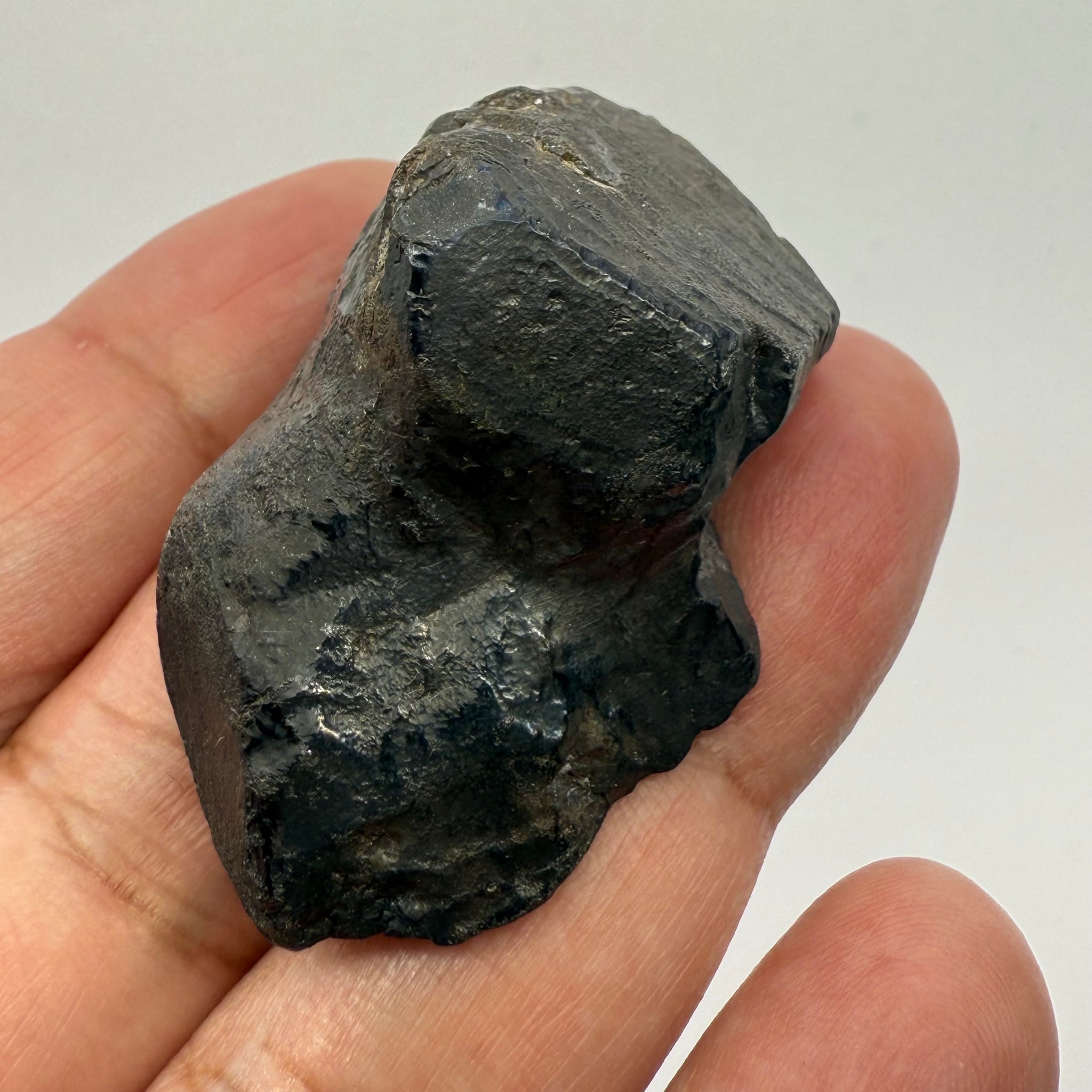 Alabandite Crystal, Merelani, same mining pit as Tanzanite, comes out with Tanzanite, Tanzania, Untreated Unheated. 53.0gm 50.3 x 29.5 x 25.5mm