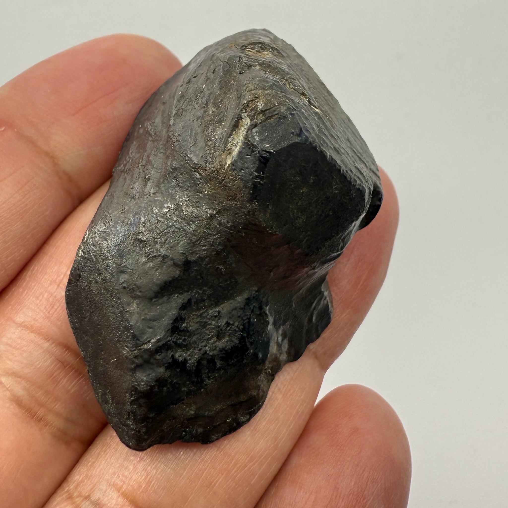 Alabandite Crystal, Merelani, same mining pit as Tanzanite, comes out with Tanzanite, Tanzania, Untreated Unheated. 53.0gm 50.3 x 29.5 x 25.5mm