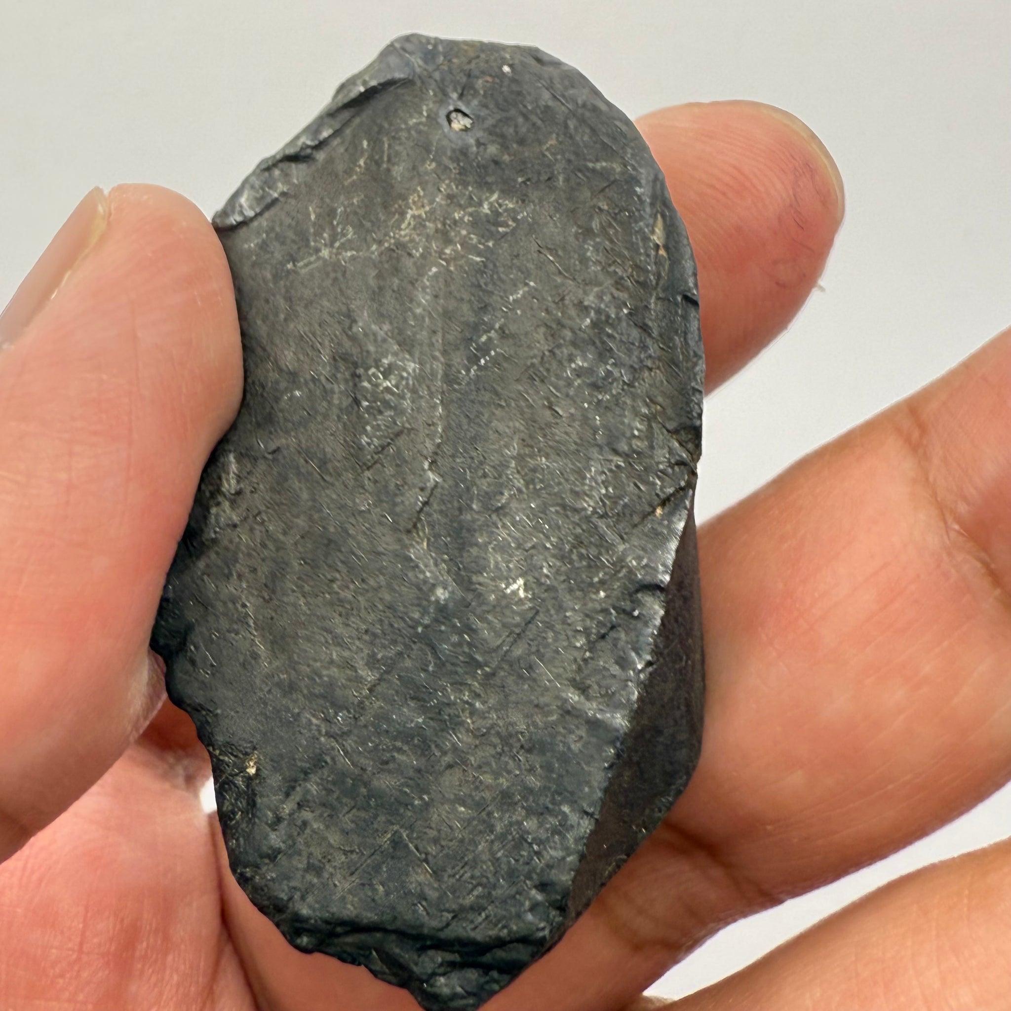 Alabandite Crystal, Merelani, same mining pit as Tanzanite, comes out with Tanzanite, Tanzania, Untreated Unheated. 53.0gm 50.3 x 29.5 x 25.5mm