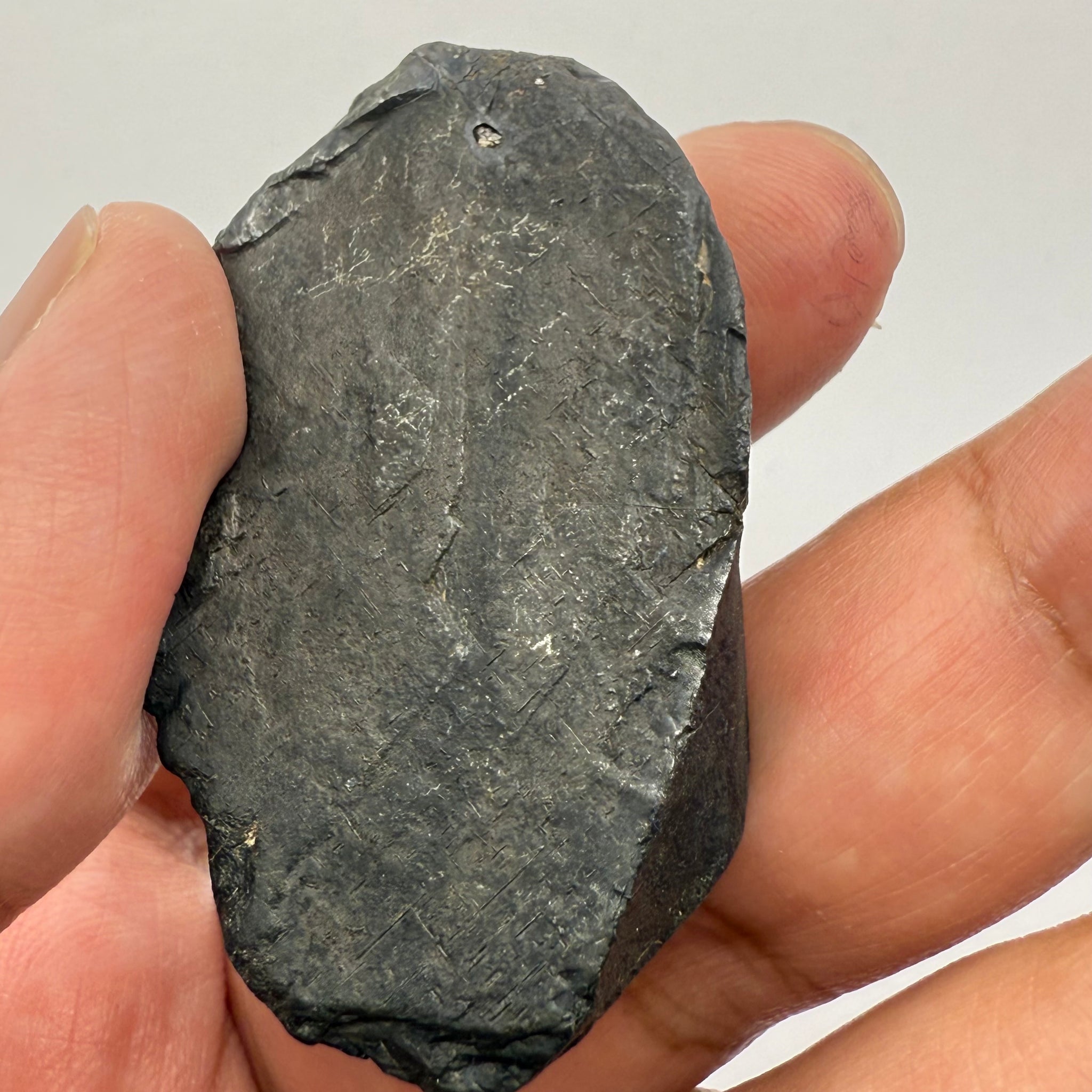 Alabandite Crystal, Merelani, same mining pit as Tanzanite, comes out with Tanzanite, Tanzania, Untreated Unheated. 53.0gm 50.3 x 29.5 x 25.5mm