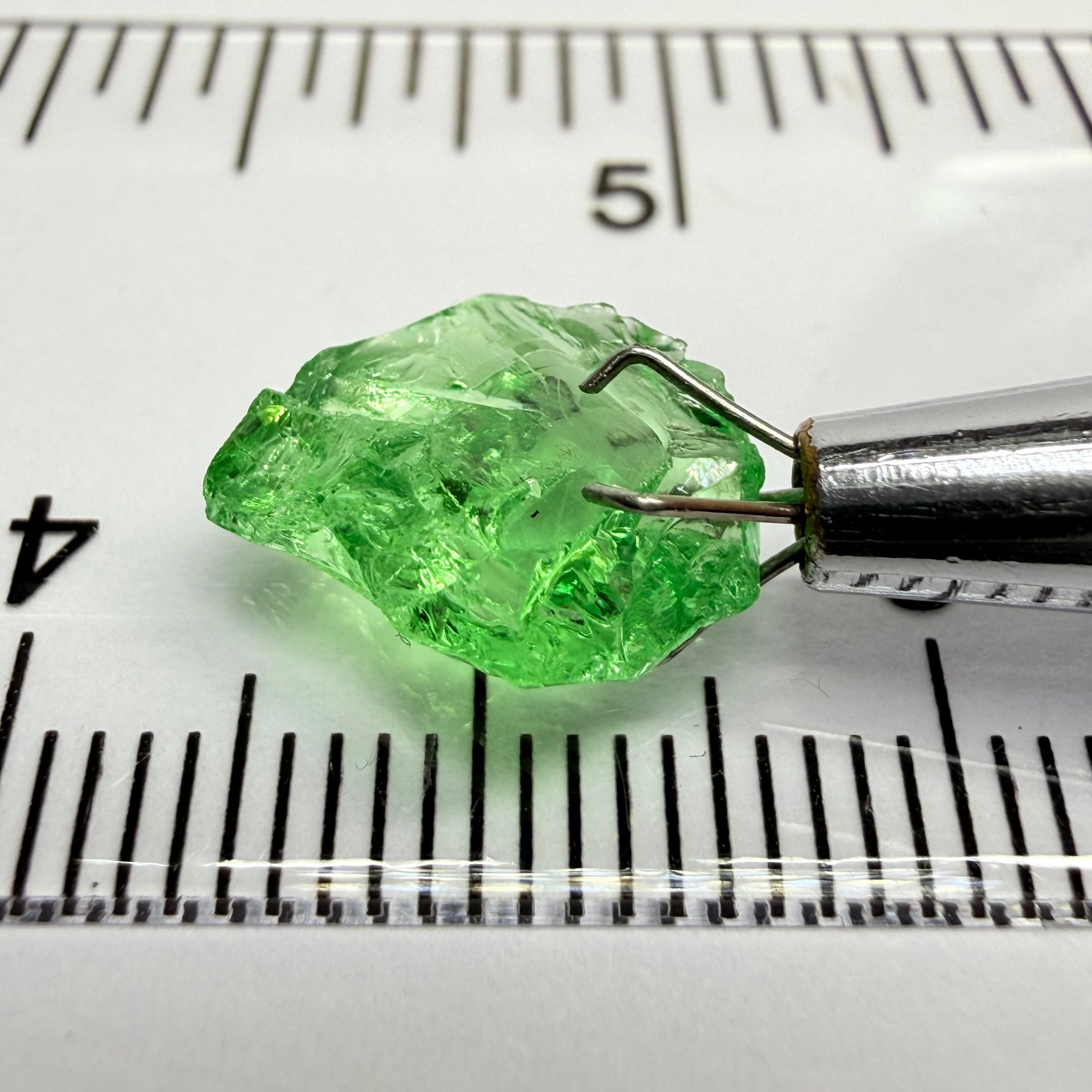 Tsavorite Garnet, 3.52ct, Tanzania, Untreated Unheated. Large cracks inside but great for setting in jewellery as is, flattish shape