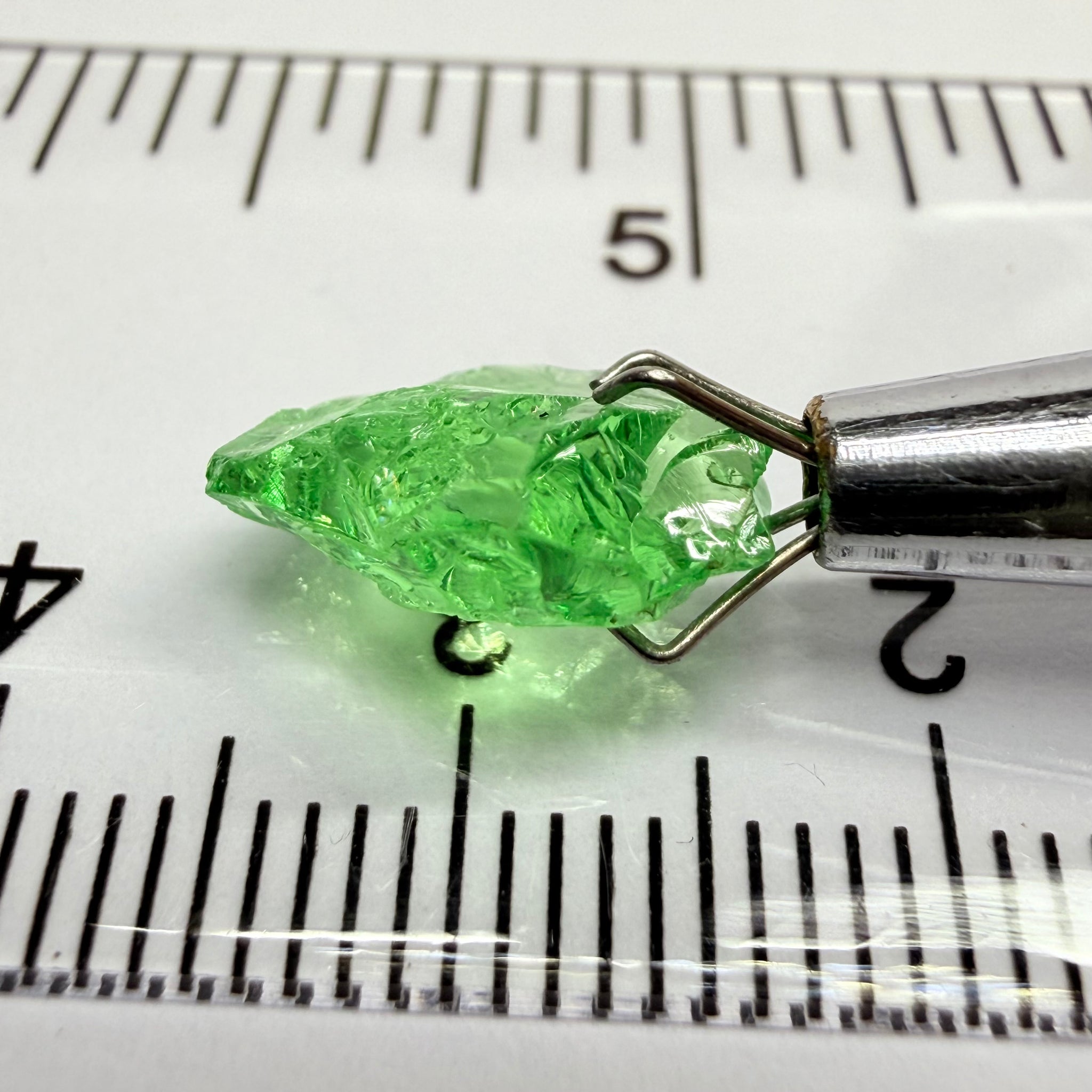 Tsavorite Garnet, 3.52ct, Tanzania, Untreated Unheated. Large cracks inside but great for setting in jewellery as is, flattish shape