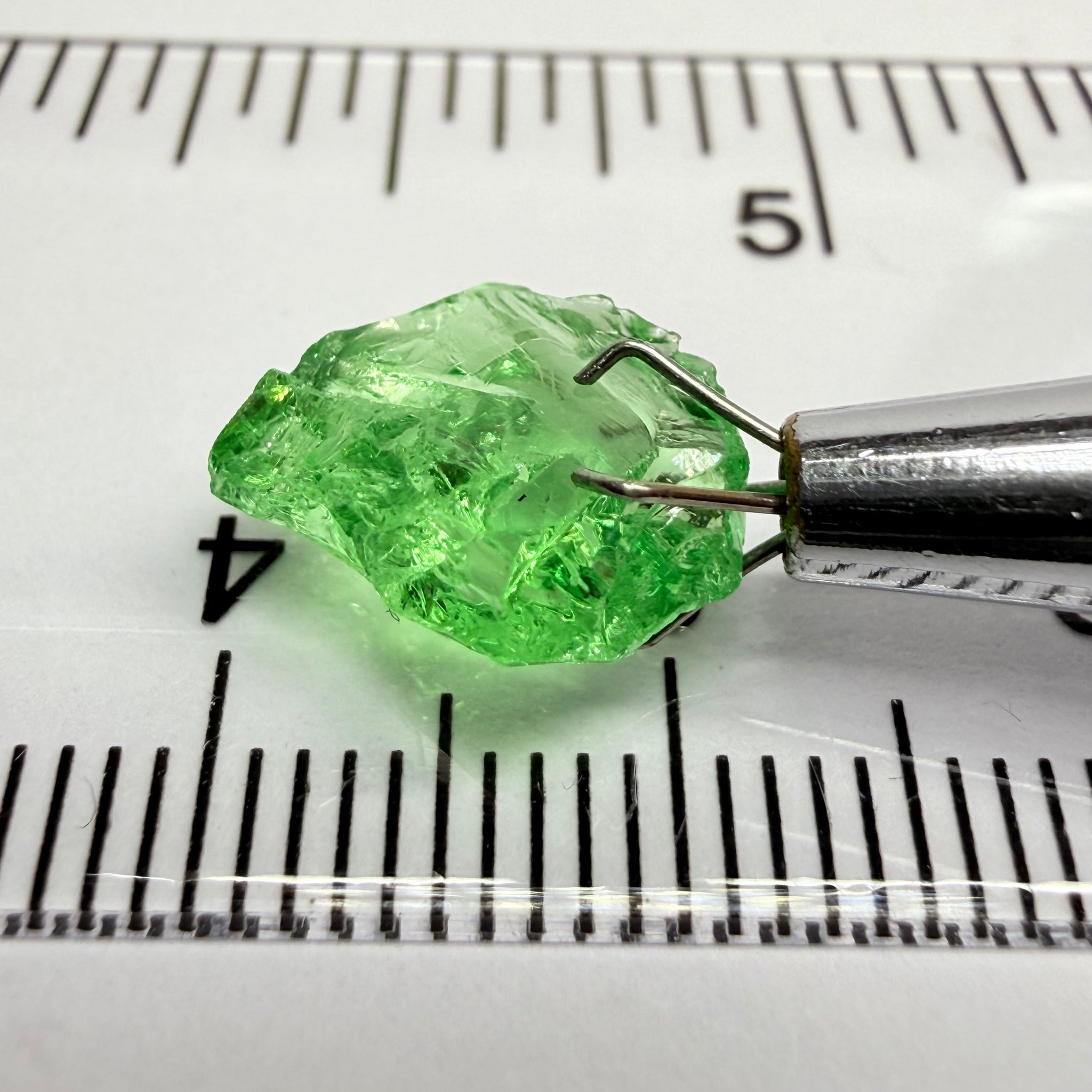 Tsavorite Garnet, 3.52ct, Tanzania, Untreated Unheated. Large cracks inside but great for setting in jewellery as is, flattish shape