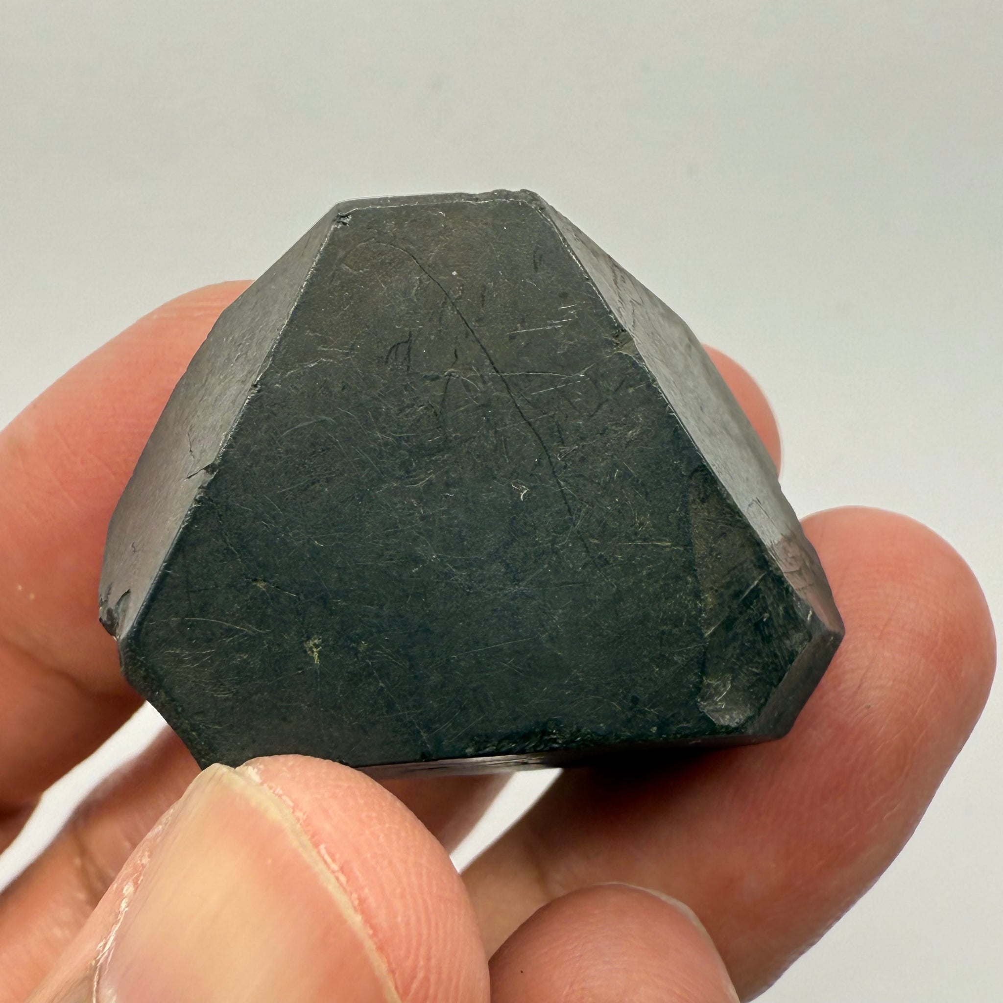 Alabandite Crystal, Merelani, same mining pit as Tanzanite, comes out with Tanzanite, Tanzania, Untreated Unheated. 43.3gm 34.7 x 32.9 x 23.5mm