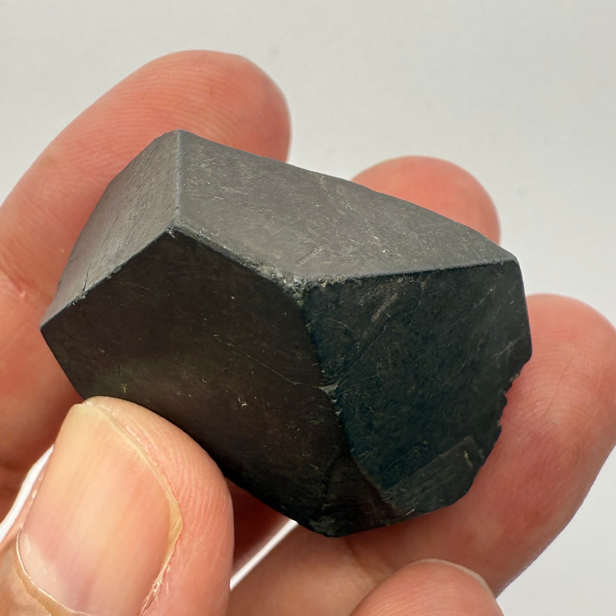 Alabandite Crystal, Merelani, same mining pit as Tanzanite, comes out with Tanzanite, Tanzania, Untreated Unheated. 43.3gm 34.7 x 32.9 x 23.5mm