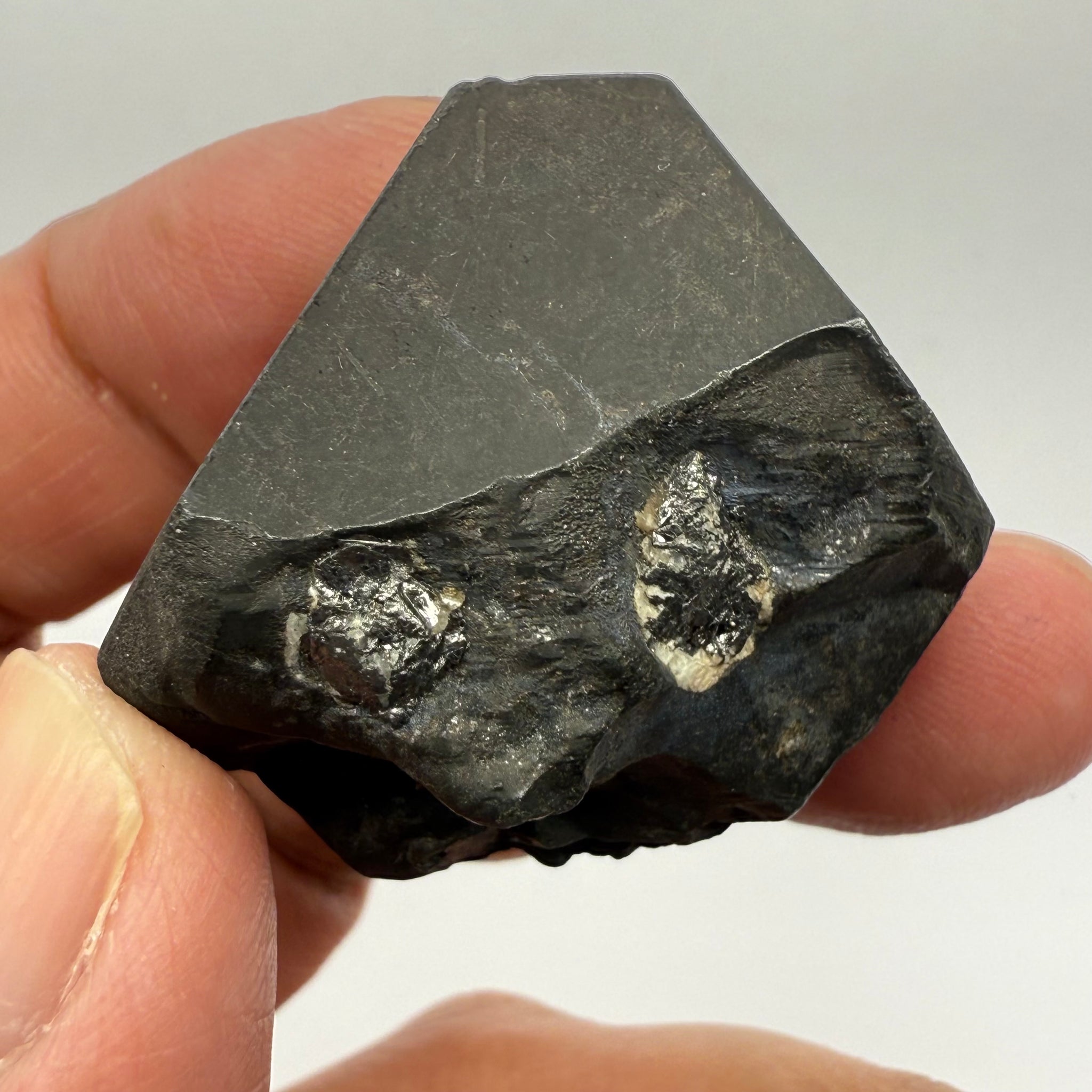 Alabandite Crystal, Merelani, same mining pit as Tanzanite, comes out with Tanzanite, Tanzania, Untreated Unheated. 43.3gm 34.7 x 32.9 x 23.5mm